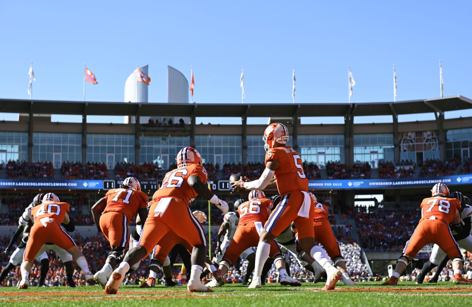 CLEMSON, SOUTH CAROLINA - NOVEMBER 26: DJ Uiagalelei #5 hands the ball to Phil Mafah #26 of the Clemson Tigers in the first quarter against the South Carolina Gamecocks at Memorial Stadium on November 26, 2022 in Clemson, South Carolina. (Photo by Eakin Howard/Getty Images)