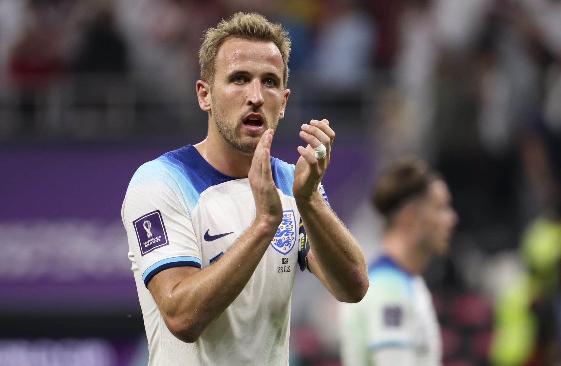 AL KHOR, QATAR - NOVEMBER 25: Harry Kane of England salutes the fans following the FIFA World Cup Qatar 2022 Group B match between England and USA at Al Bayt Stadium on November 25, 2022 in Al Khor, Qatar. (Photo by Jean Catuffe/Getty Images)Harry Maguire of England