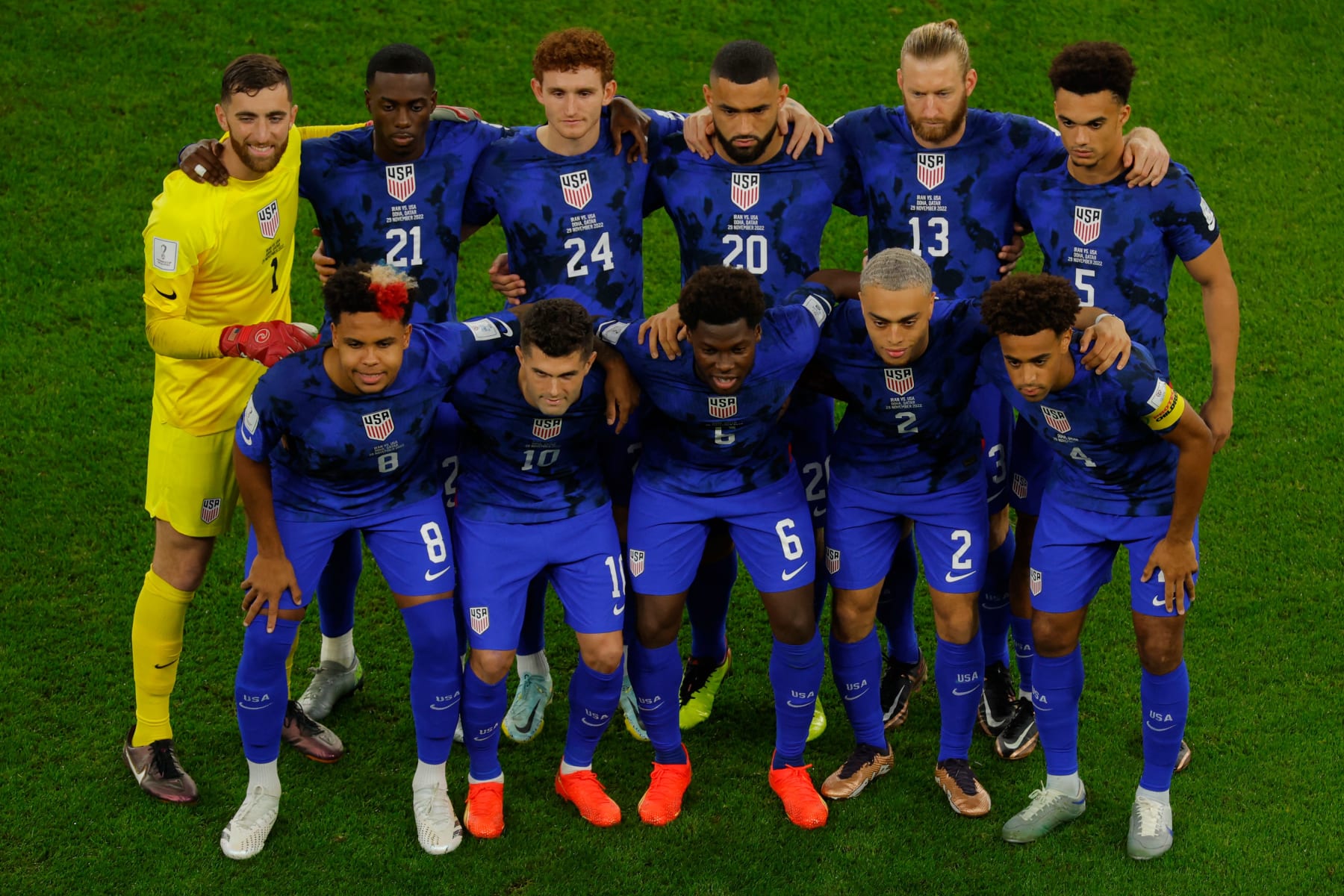 (Back L) USA's goalkeeper #01 Matt Turner, USA's forward #21 Timothy Weah, USA's forward #24 Josh Sargent, USA's defender #13 Tim Ream, USA's defender #05 Antonee Robinson, (front L) USA's midfielder #08 Weston McKennie, USA's forward #10 Christian Pulisic, USA's midfielder #06 Yunus Musah, USA's defender #02 Sergino Dest, USA's midfielder #04 Tyler Adams pose for a group picture during the Qatar 2022 World Cup Group B football match between Iran and USA at the Al-Thumama Stadium in Doha on November 29, 2022. (Photo by Odd ANDERSEN / AFP) (Photo by ODD ANDERSEN/AFP via Getty Images)
