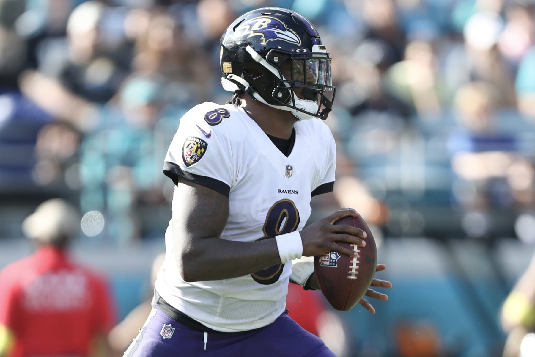 JACKSONVILLE, FLORIDA - NOVEMBER 27: Lamar Jackson #8 of the Baltimore Ravens drops back to pass during the first half against the Jacksonville Jaguars at TIAA Bank Field on November 27, 2022 in Jacksonville, Florida. (Photo by Courtney Culbreath/Getty Images)