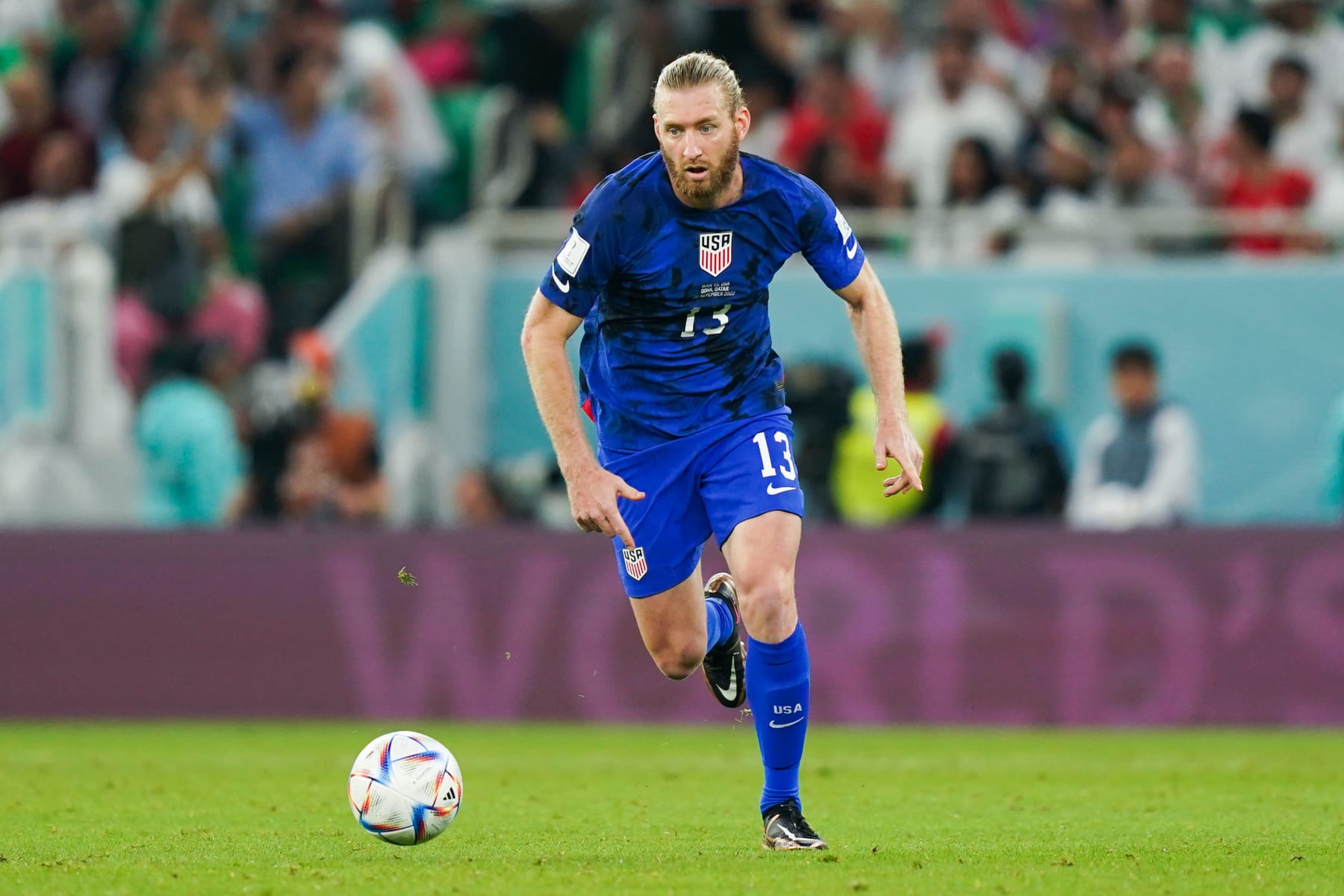 DOHA, QATAR - NOVEMBER 29: Tim Ream of United States drives the ball during the FIFA World Cup Qatar 2022 Group B match between IR Iran and USA at Al Thumama Stadium on November 29, 2022 in Doha, Qatar. (Photo by Khalil Bashar/Jam Media/Getty Images)