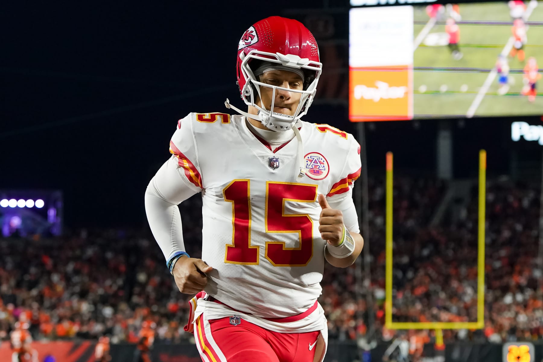 CINCINNATI, OHIO - DECEMBER 04: Patrick Mahomes #15 of the Kansas City Chiefs jogs across the field at halftime against the Cincinnati Bengals at Paycor Stadium on December 04, 2022 in Cincinnati, Ohio. (Photo by Dylan Buell/Getty Images)