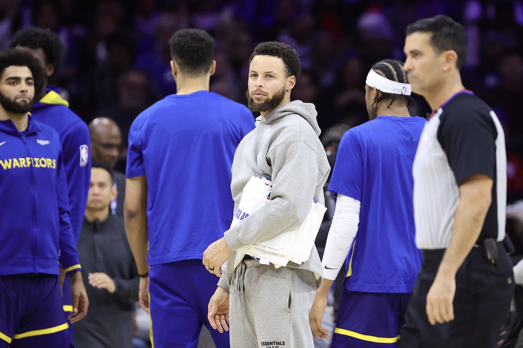 PHILADELPHIA, PENNSYLVANIA - DECEMBER 16: Stephen Curry #30 of the Golden State Warriors looks on during the third quarter against the Philadelphia 76ers at Wells Fargo Center on December 16, 2022 in Philadelphia, Pennsylvania. NOTE TO USER: User expressly acknowledges and agrees that, by downloading and or using this photograph, User is consenting to the terms and conditions of the Getty Images License Agreement. (Photo by Tim Nwachukwu/Getty Images)