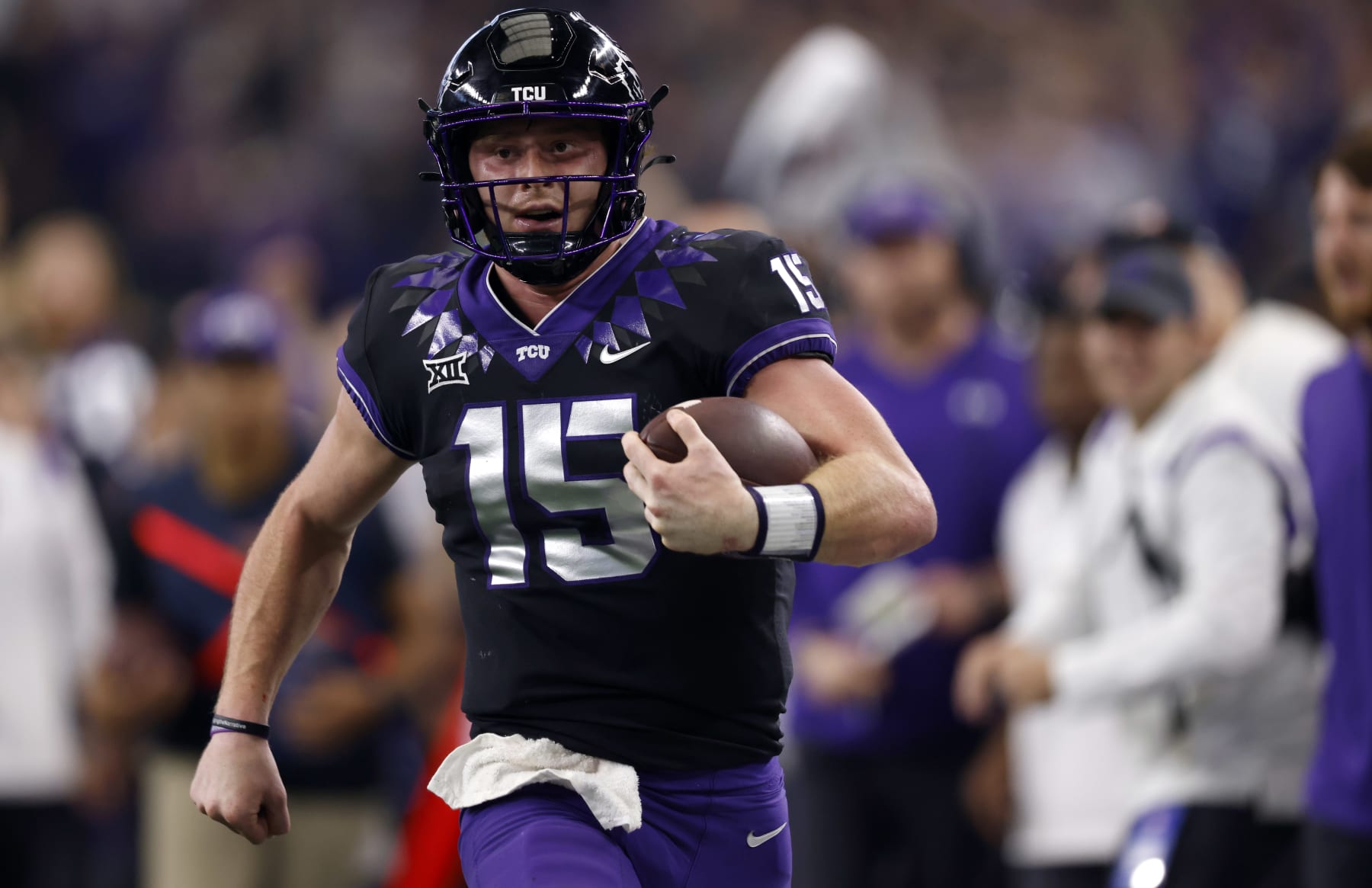 ARLINGTON, TX - DECEMBER 3: Max Duggan #15 of the TCU Horned Frogs carries the ball against the Kansas State Wildcats in the second half of the Big 12 Football Championship at AT&T Stadium on December 3, 2022 in Arlington, Texas. Kansas State won 31-28 in overtime. (Photo by Ron Jenkins/Getty Images)