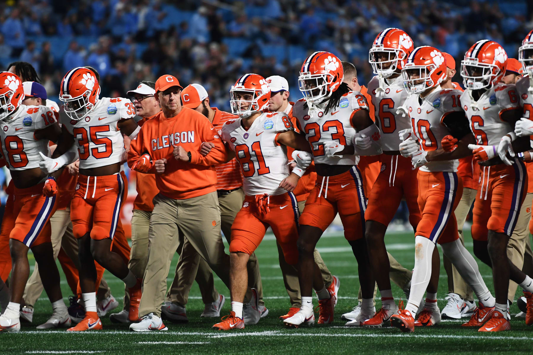 CHARLOTTE, NORTH CAROLINA - DECEMBER 03: Head coach Dabo Swinney of the Clemson Tigers walks with his team before their game against the North Carolina Tar Heels for the ACC Championship at Bank of America Stadium on December 03, 2022 in Charlotte, North Carolina. (Photo by Eakin Howard/Getty Images)