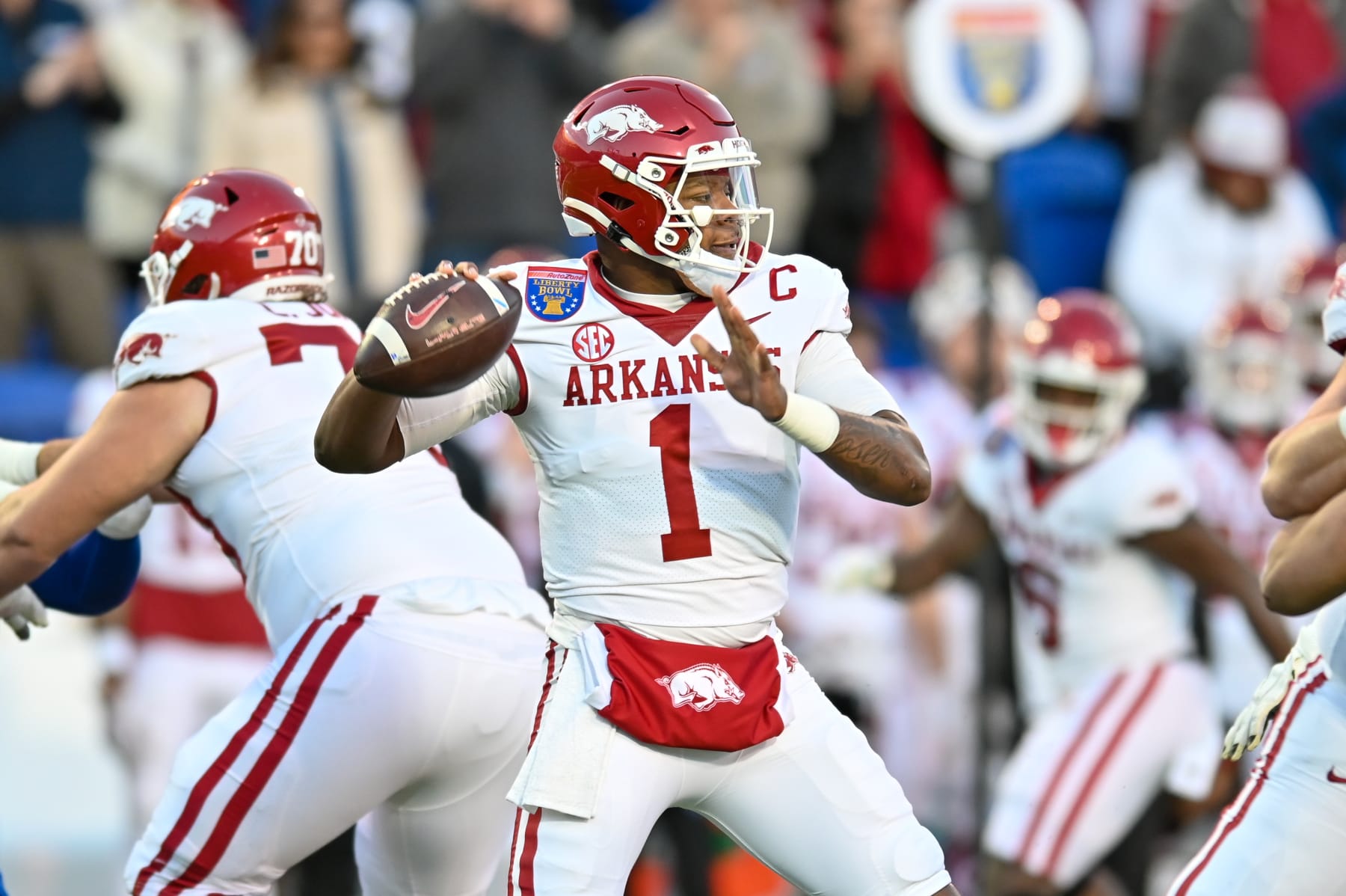 Arkansas quarterback KJ Jefferson wears bowl championship rings