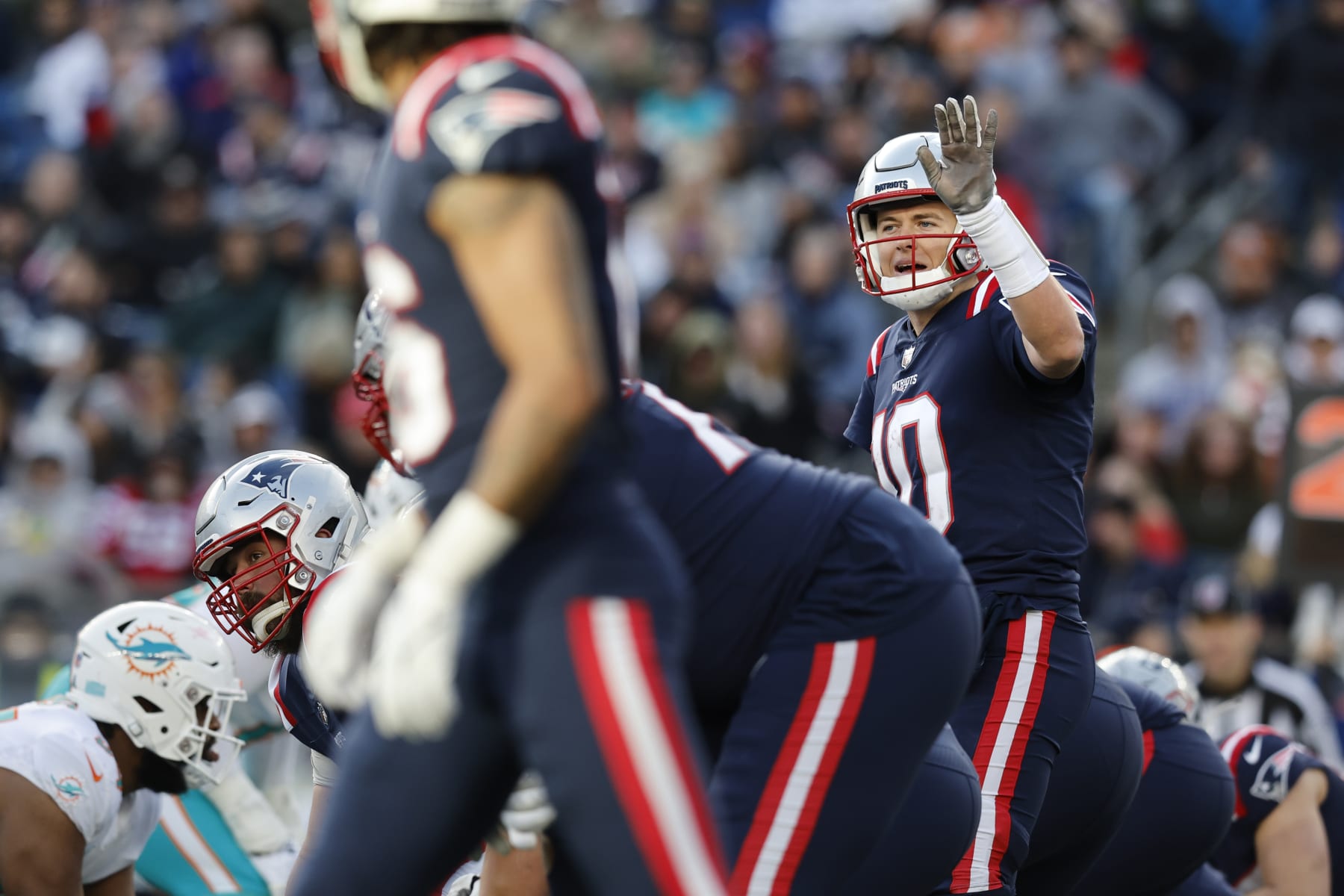 Dugger interception return helps Patriots beat Dolphins 23-21