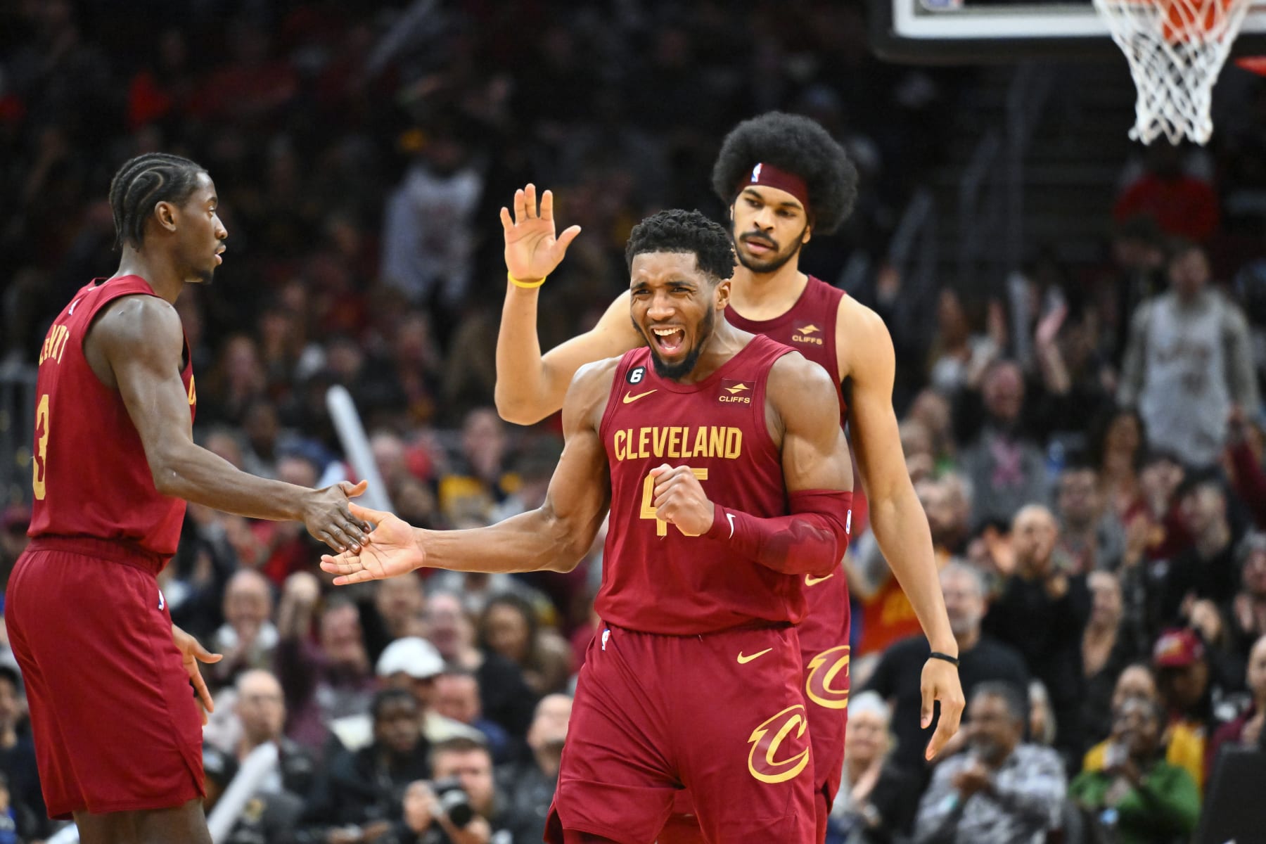 CLEVELAND, OHIO - JANUARY 02: Caris LeVert #3 and Jarrett Allen #31 celebrate with Donovan Mitchell #45 of the Cleveland Cavaliers after Mitchell scored during the fourth quarter against the Chicago Bulls at Rocket Mortgage Fieldhouse on January 02, 2023 in Cleveland, Ohio. The Cavaliers defeated the Bulls 145-134. NOTE TO USER: User expressly acknowledges and agrees that, by downloading and or using this photograph, User is consenting to the terms and conditions of the Getty Images License Agreement. (Photo by Jason Miller/Getty Images) CLEVELAND, OHIO - JANUARY 02: Caris LeVert #3 and Jarrett Allen #31 celebrate with Donovan Mitchell #45 of the Cleveland Cavaliers after Mitchell scored during the fourth quarter against the Chicago Bulls at Rocket Mortgage Fieldhouse on January 02, 2023 in Cleveland, Ohio. The Cavaliers defeated the Bulls 145-134. NOTE TO USER: User expressly acknowledges and agrees that, by downloading and or using this photograph, User is consenting to the terms and conditions of the Getty Images License Agreement. (Photo by Jason Miller/Getty Images)