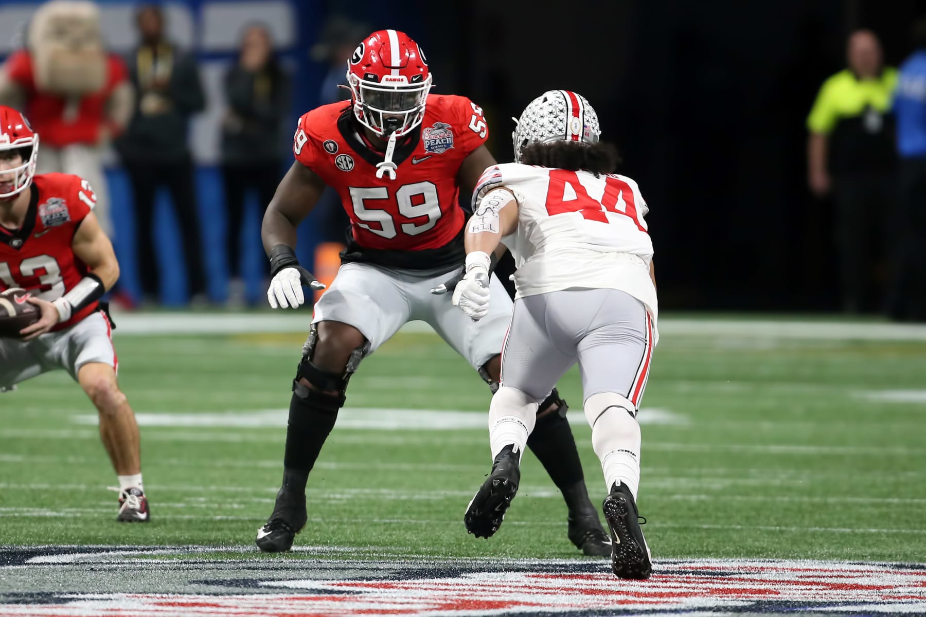 ATLANTA, GA - DECEMBER 31: Georgia Bulldogs offensive lineman Broderick Jones (59) during the college football Playoff Semifinal game at the Chick-fil-a Peach Bowl between the Georgia Bulldogs and the Ohio State Buckeyes on December 31, 2022 at Mercedes-Benz Stadium in Atlanta, Georgia. (Photo by Michael Wade/Icon Sportswire via Getty Images)