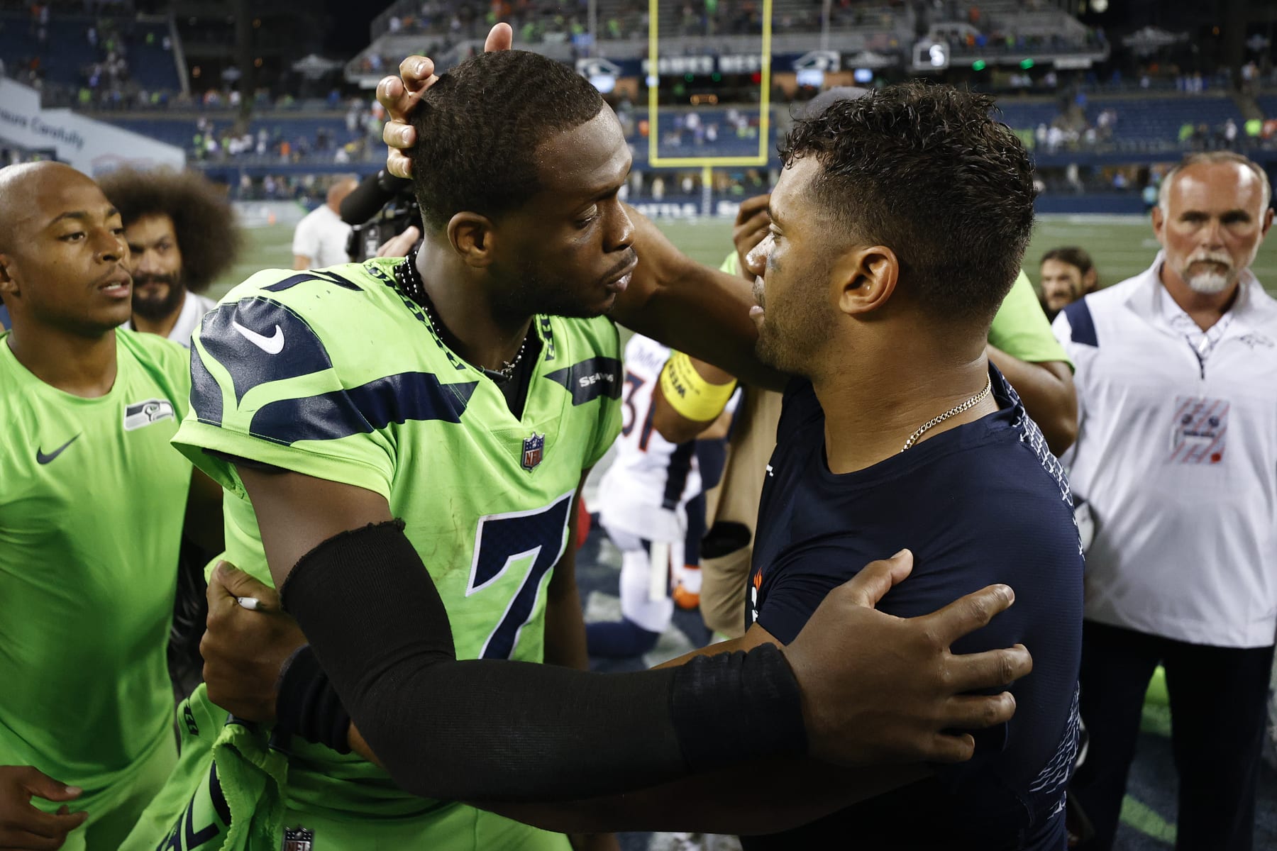 High Knees' Russell Wilson of Broncos Trolled by Seattle Seahawks Mascot  Blitz on Germany Trip - Sports Illustrated Seattle Seahawks News, Analysis  and More