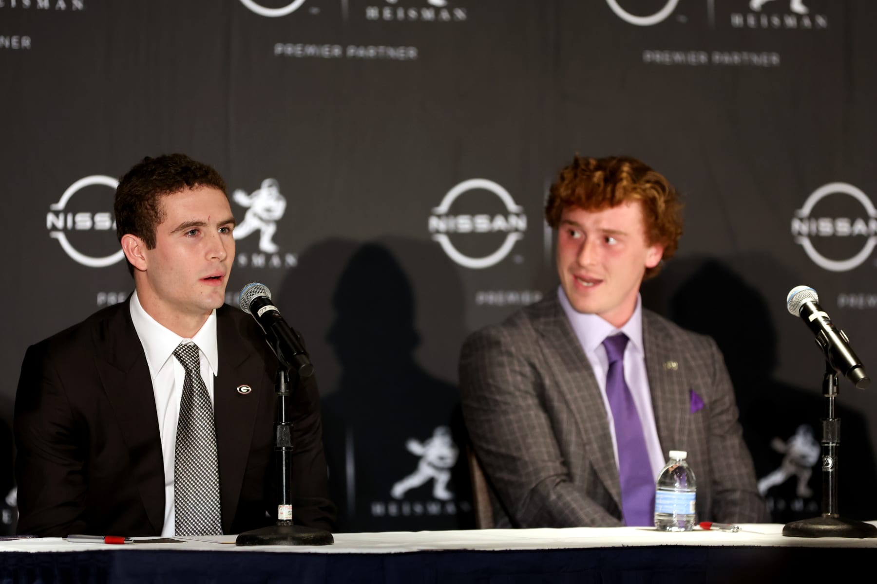 NEW YORK, NEW YORK - DECEMBER 10: (L-R) Quarterback Stetson Bennett of the Georgia Bulldogs and Quarterback Max Duggan of the TCU Horned Frogs speak to the media during a press conference prior to the 2022 Heisman Trophy Presentation at New York Marriott Marquis Hotel on December 10, 2022 in New York City. (Photo by Sarah Stier/Getty Images)
