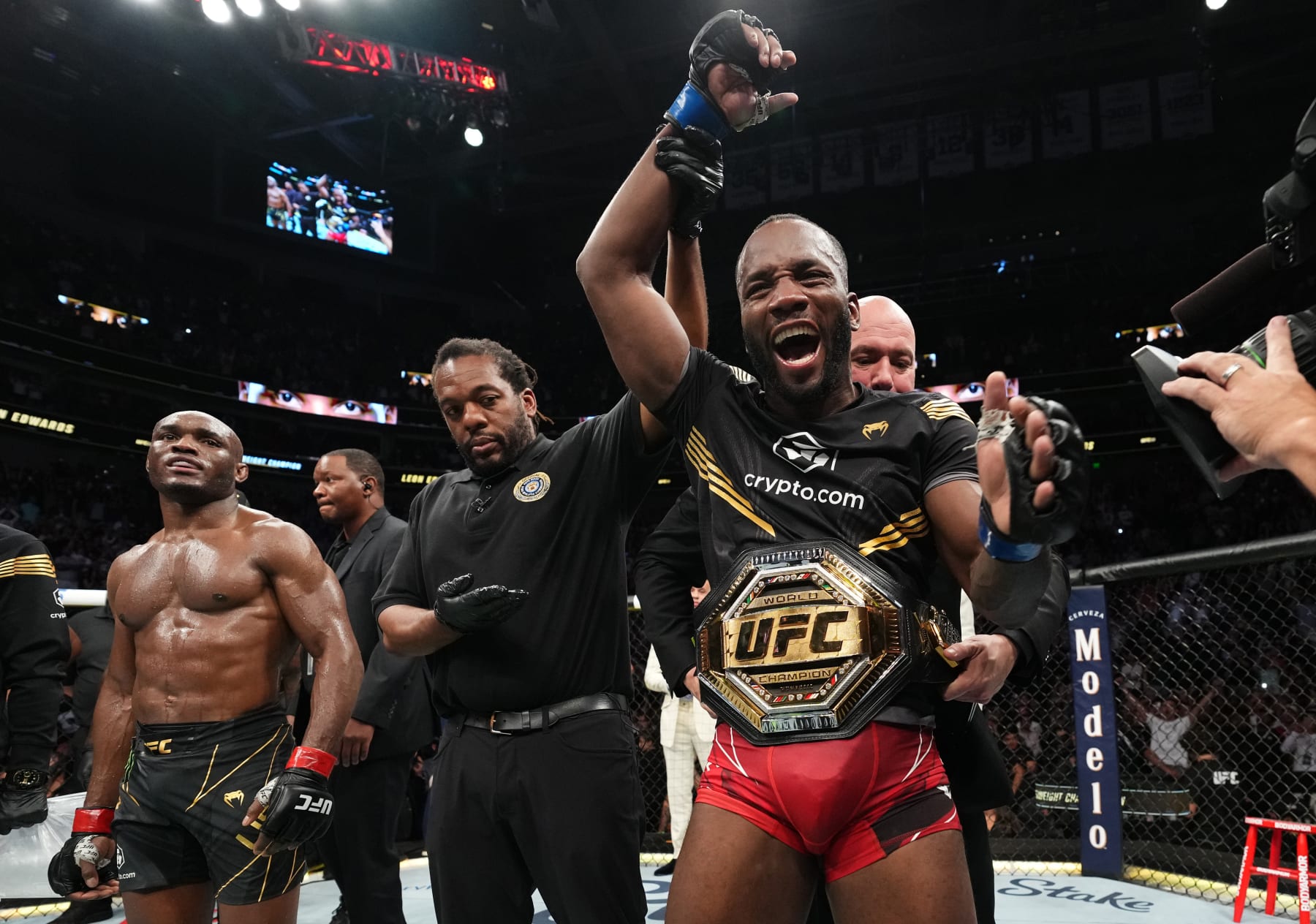 Kamaru Usman and Leon Edwards (right).