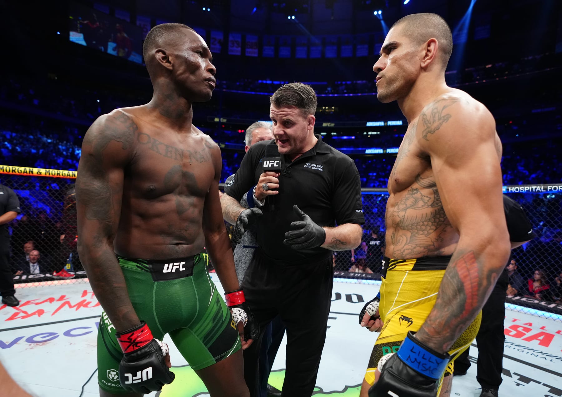 Israel Adesanya and Alex Pereira (right).