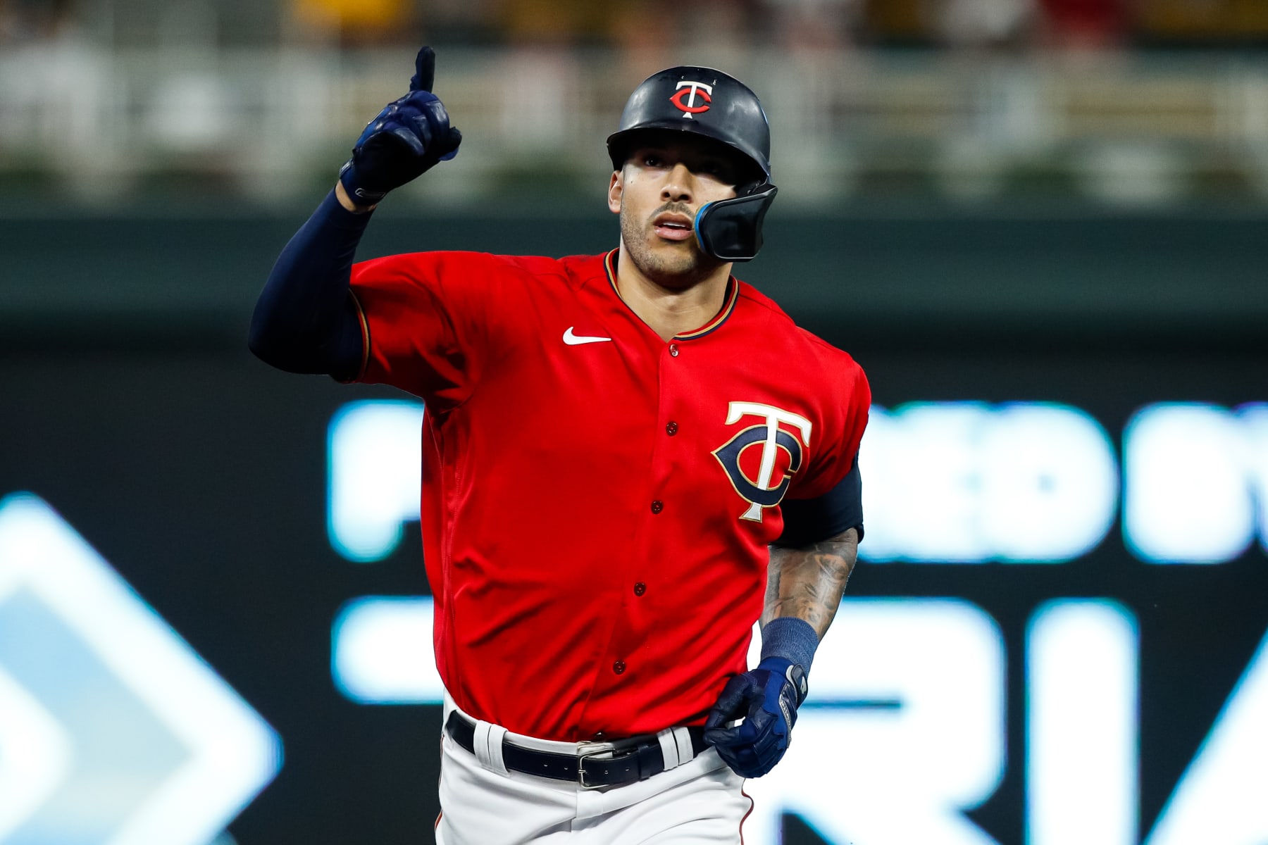 MINNEAPOLIS, MN - SEPTEMBER 13: Carlos Correa #4 of the Minnesota Twins celebrates his two-run home run as he rounds the bases against the Kansas City Royals in the fifth inning of the game at Target Field on September 13, 2022 in Minneapolis, Minnesota. The Twins defeated the Royals 6-3. (Photo by David Berding/Getty Images)