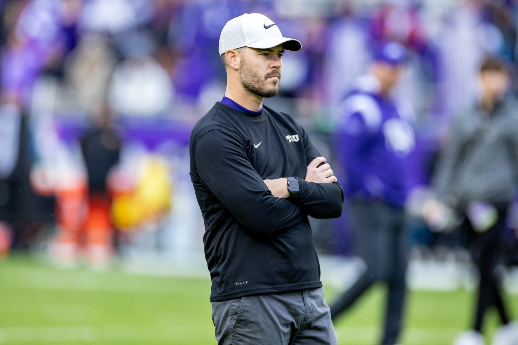 FORT WORTH, TX - NOVEMBER 26: TCU offensive coordinator Garrett Riley looks on during warmups during the college football game between the Iowa State Cyclones and TCU Horned Frogs on November 26, 2022 at Amon G. Carter Stadium in Fort Worth, TX. (Photo by Matthew Visinsky/Icon Sportswire via Getty Images)