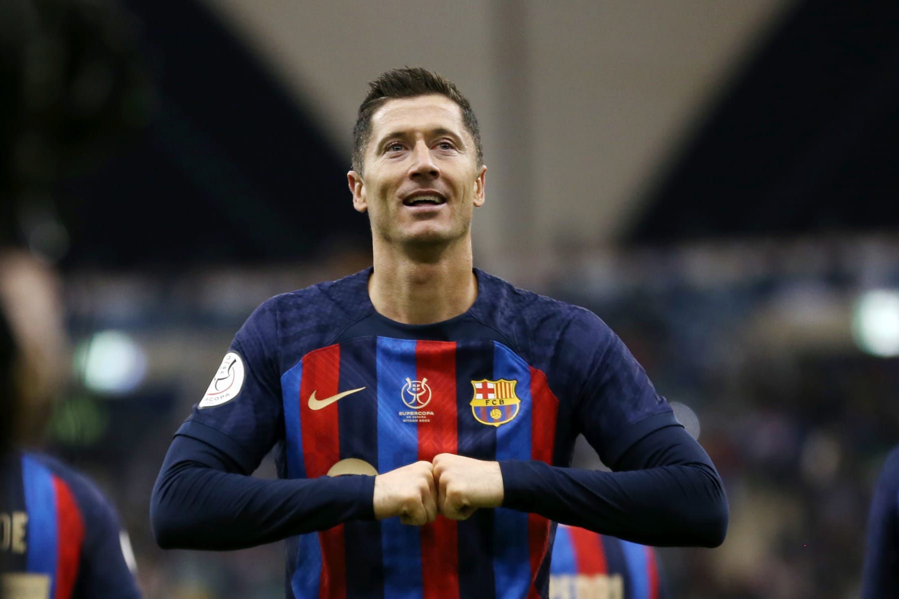 RIYADH, SAUDI ARABIA - JANUARY 12: Robert Lewandowski of FC Barcelona celebrates after scoring the team's first goal during the Super Copa de España semi-final match between Real Betis and FC Barcelona at King Fahd International Stadium on January 12, 2023 in Riyadh, Saudi Arabia. (Photo by Yasser Bakhsh/Getty Images)