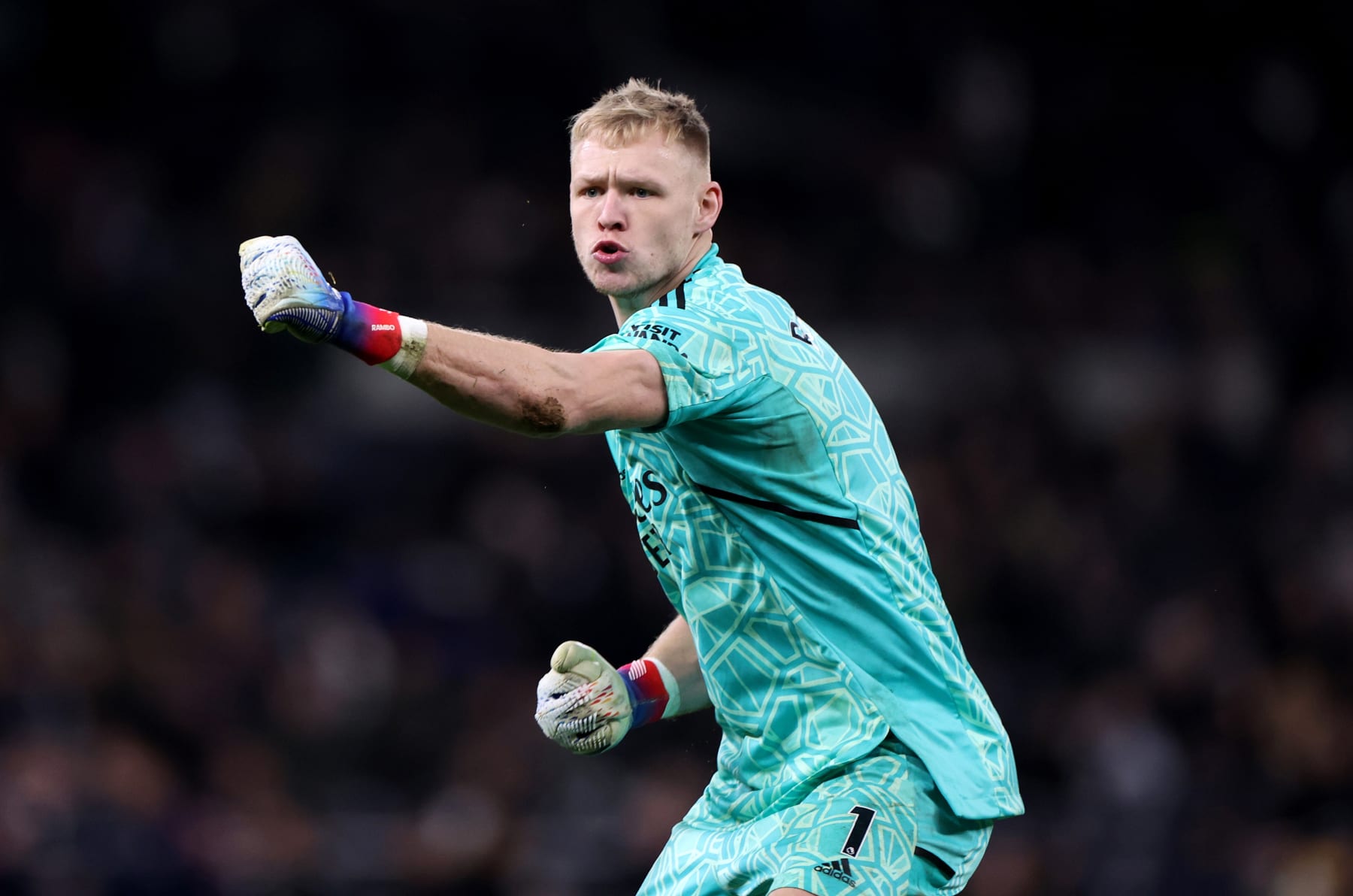 LONDON, ENGLAND - JANUARY 15: Aaron Ramsdale of Arsenal celebrates towards the Tottenham fans following the Premier League match between Tottenham Hotspur and Arsenal FC at Tottenham Hotspur Stadium on January 15, 2023 in London, England. (Photo by Catherine Ivill/Getty Images)