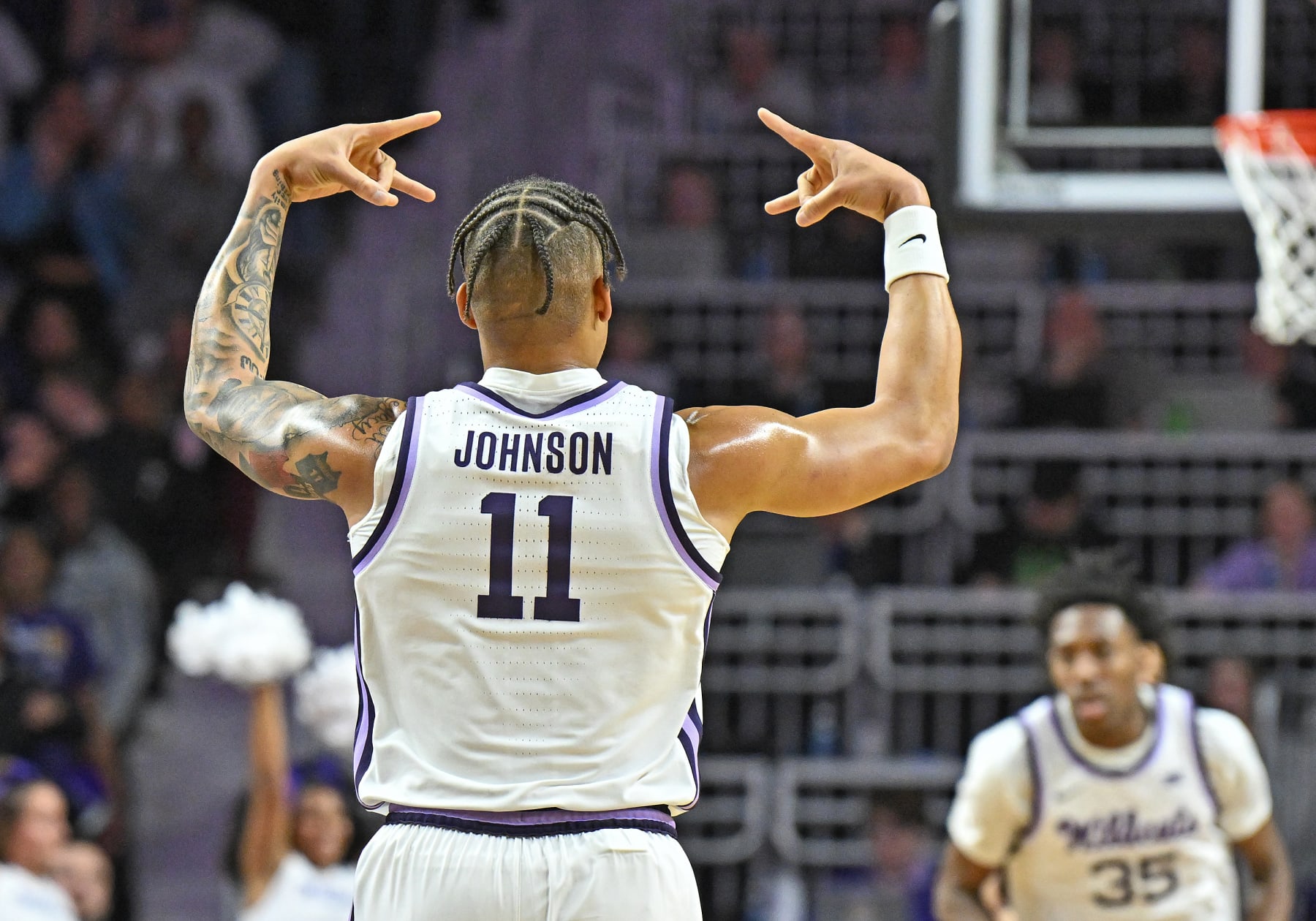 MANHATTAN, KS - JANUARY 17:  Keyontae Johnson #11 of the Kansas State Wildcats reacts after hitting a three point shot in the first half against the Kansas Jayhawks at Bramlage Coliseum on January 17, 2023 in Manhattan, Kansas.  (Photo by Peter Aiken/Getty Images)