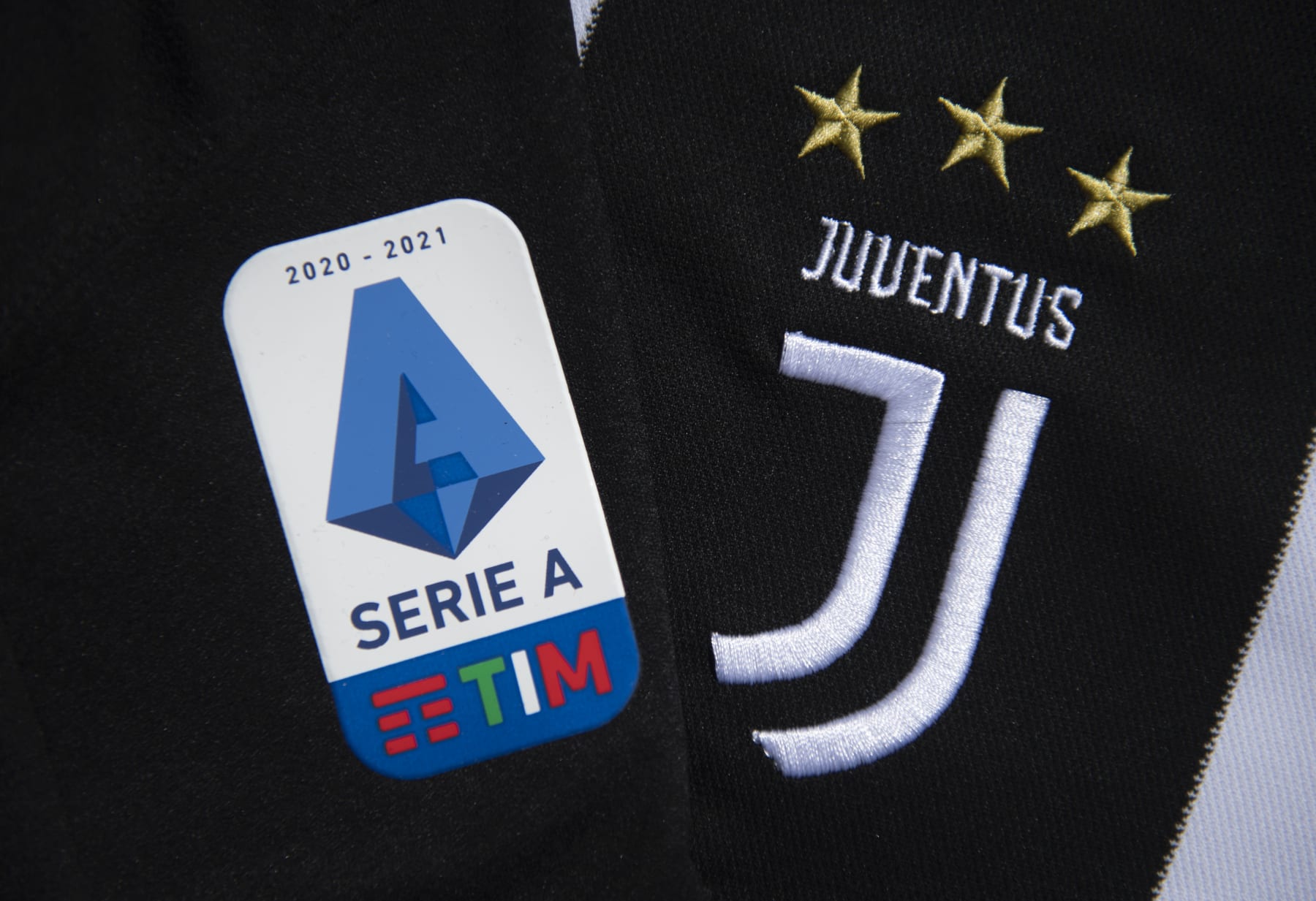 MANCHESTER, ENGLAND - MAY 10: The Serie A logo and Juventus club badge on their first team home shirt amid talk of Serie A expelling Juventus if they enter the European Super League on May 10, 2021 in Manchester, United Kingdom. (Photo by Visionhaus/Getty Images)