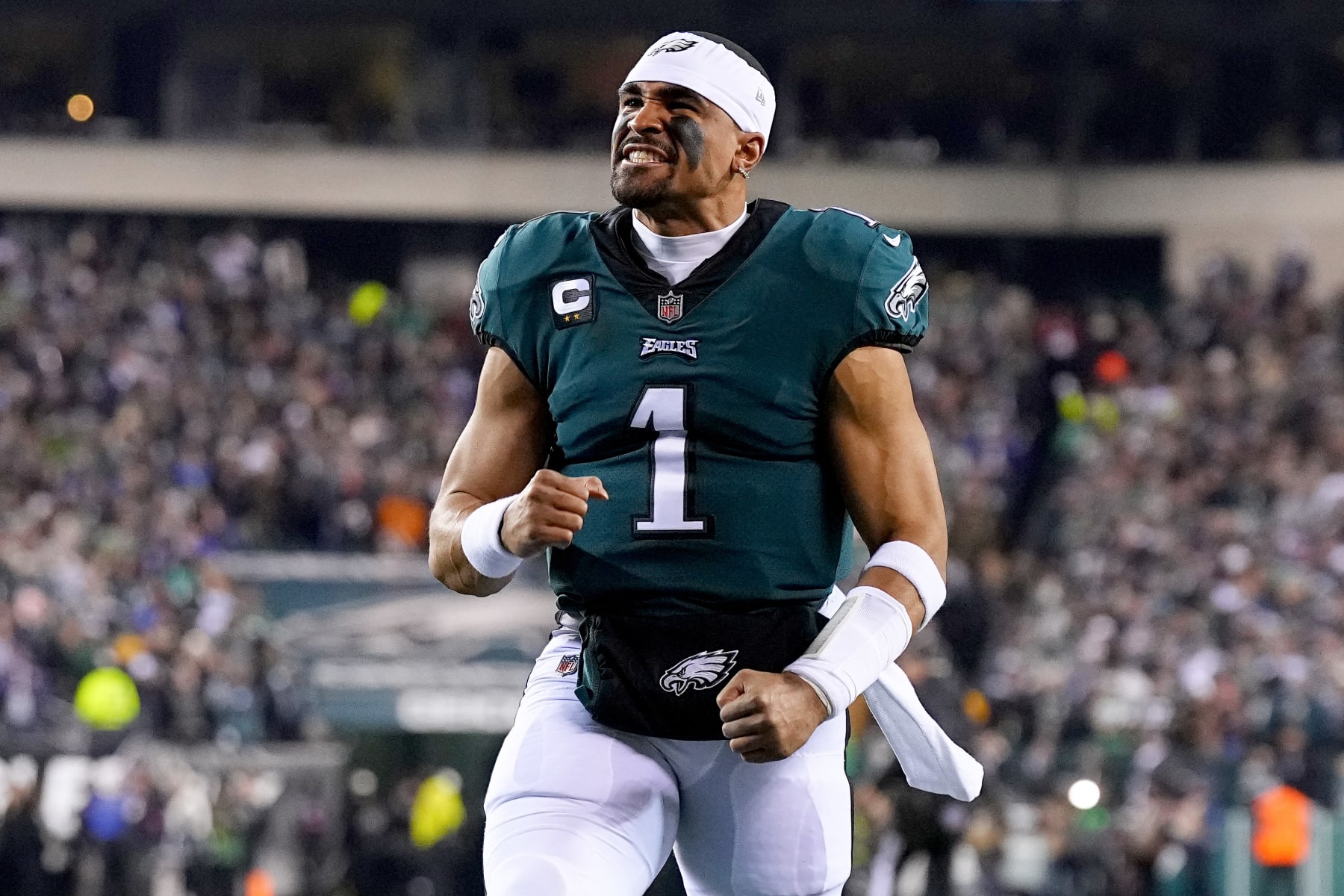 Philadelphia Eagles quarterback Jalen Hurts (1) reacts after a touchdown  against the New York Giants during an NFL football game Sunday, Dec. 11,  2022, in East Rutherford, N.J. (AP Photo/Adam Hunger Stock