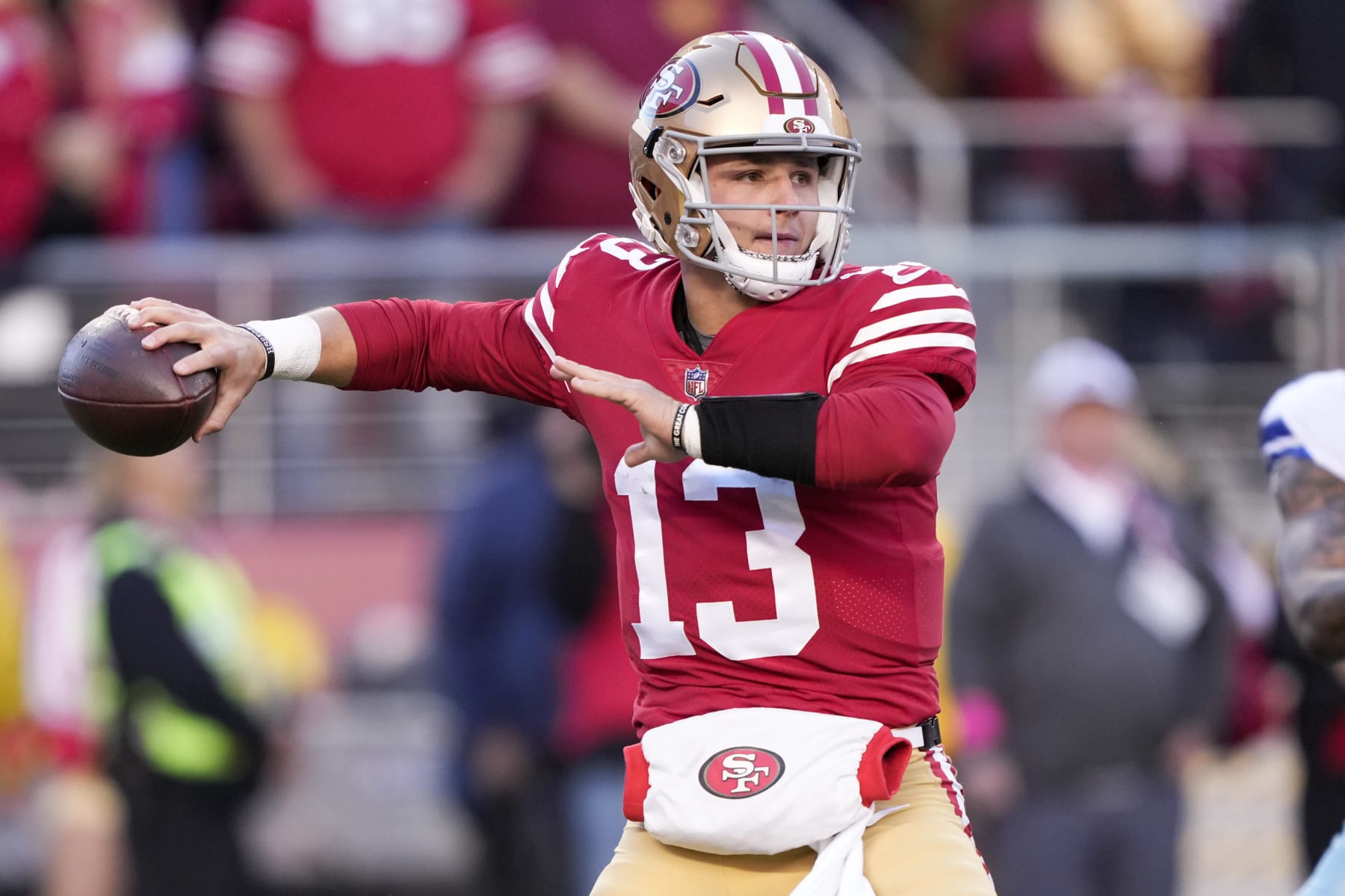 SANTA CLARA, CALIFORNIA - JANUARY 22: Brock Purdy #13 of the San Francisco 49ers throws a pass against the Dallas Cowboys during the first quarter in the NFC Divisional Playoff game at Levi's Stadium on January 22, 2023 in Santa Clara, California. (Photo by Thearon W. Henderson/Getty Images)