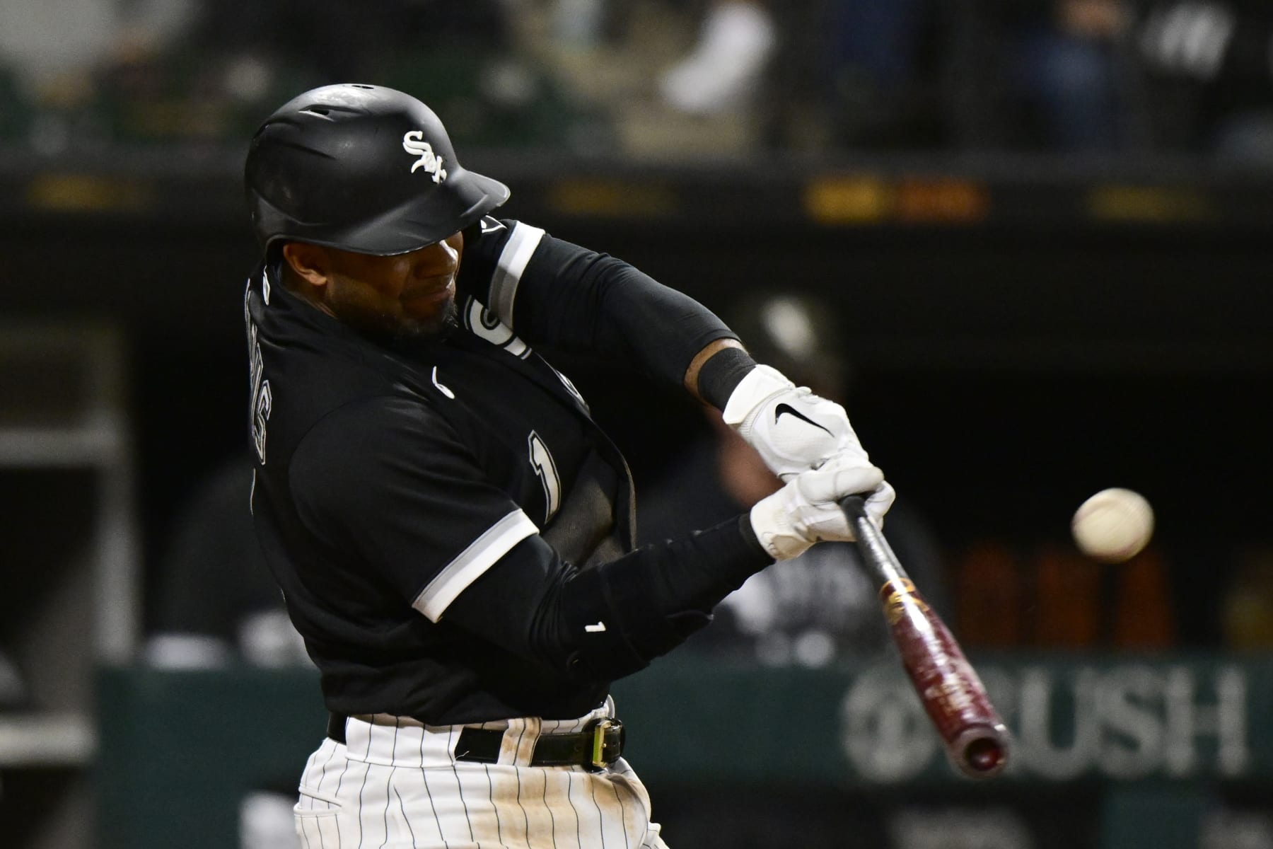 Eloy Jimenez Chicago White Sox Unsigned Hitting in Black Jersey Photograph