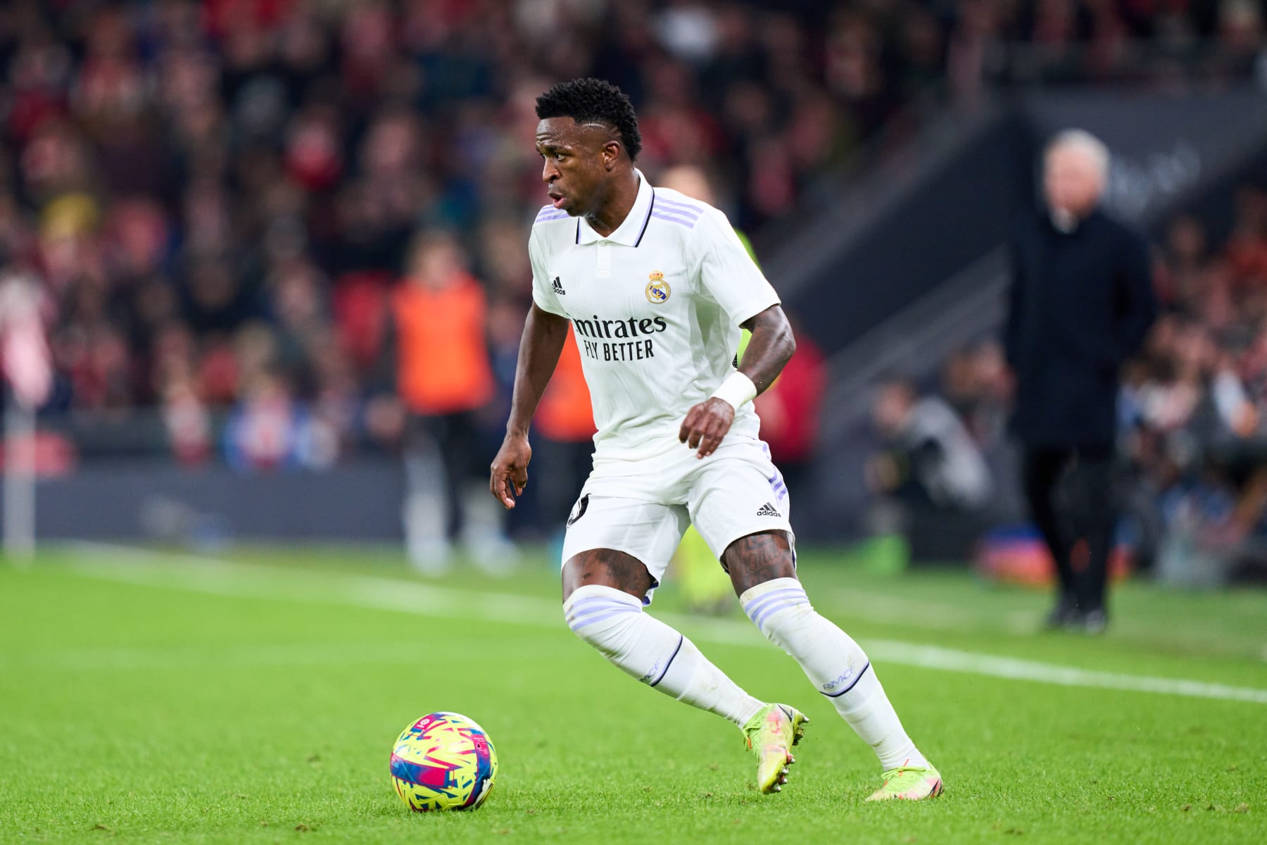 BILBAO, SPAIN - JANUARY 22: Vinicius Junior of Real Madrid in action during the LaLiga Santander match between Athletic Club and Real Madrid CF at San Mames Stadium on January 22, 2023 in Bilbao, Spain. (Photo by Juan Manuel Serrano Arce/Getty Images)