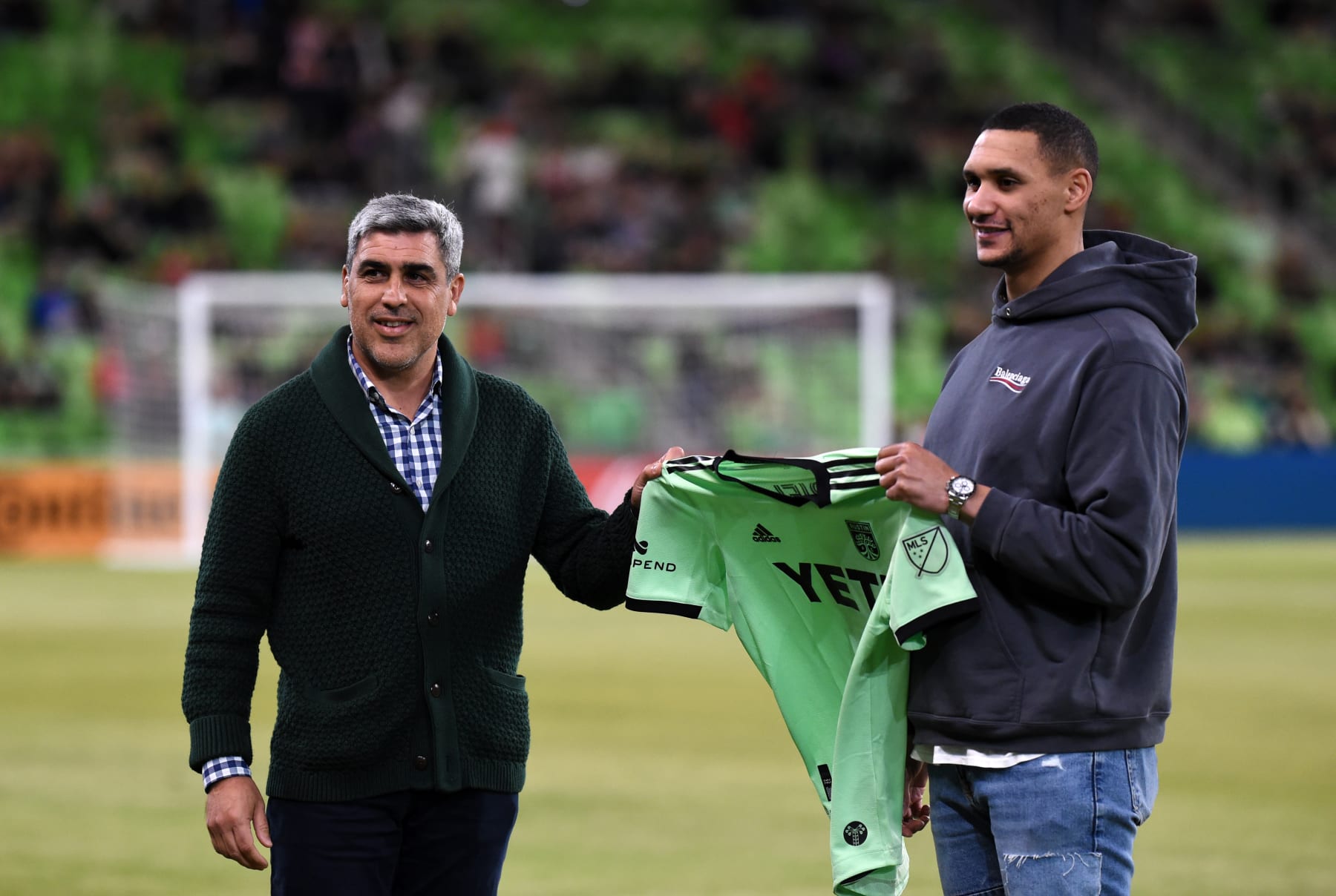 AUSTIN, TX - FEBRUARY 16: Austin FC general manager Claudio Reyna (left) greets newly signed defender Ruben Gabrielson (right) prior to start of game between Atlas and Austin FC on February 16, 2022 at Q2 Stadium in Austin, TX. (Photo by John Rivera/Icon Sportswire via Getty Images)