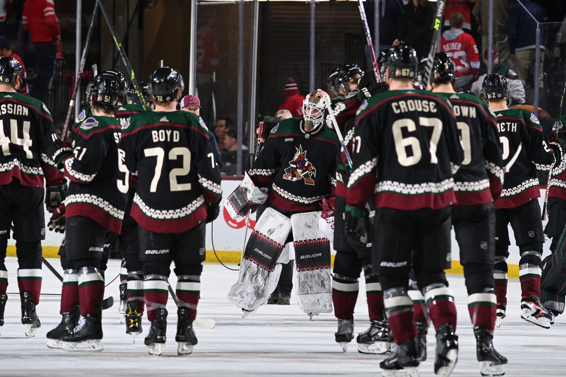 TEMPE, ARIZONA - JANUARY 17: Connor Ingram #39 of the Arizona Coyotes and teammates celebrate a win against the Detroit Red Wings at Mullett Arena on January 17, 2023 in Tempe, Arizona. (Photo by Norm Hall/NHLI via Getty Images)