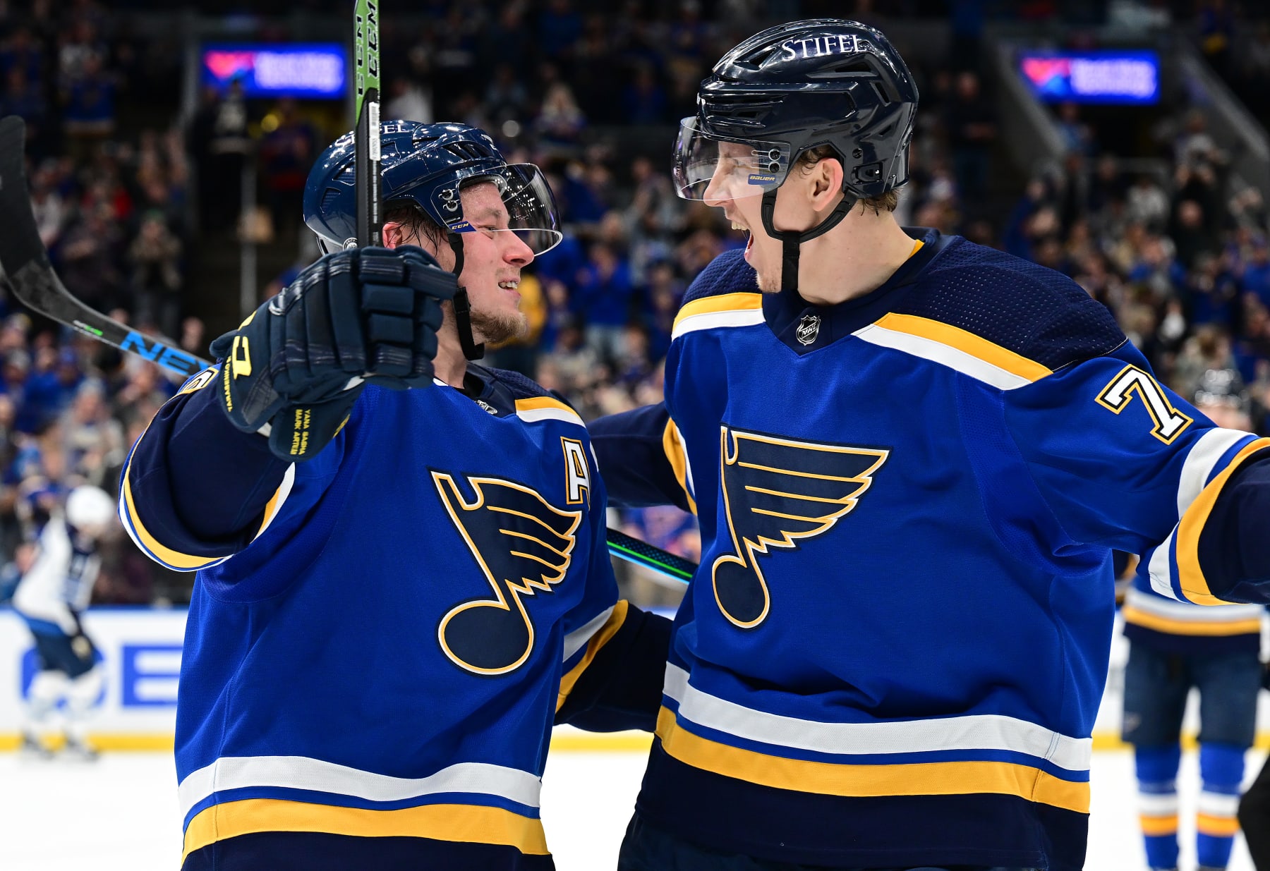 ST. LOUIS, MO - MARCH 13: St. Louis Blues defenseman Niko Mikkola (77) congratulates St. Louis Blues right wing Vladimir Tarasenko (91) after his goal during an NHL game between the Winnipeg Jets and the St. Louis Blues on March 13, 2022, at Enterprise Center, St. Louis , MO. (Photo by Keith Gillett/Icon Sportswire via Getty Images),