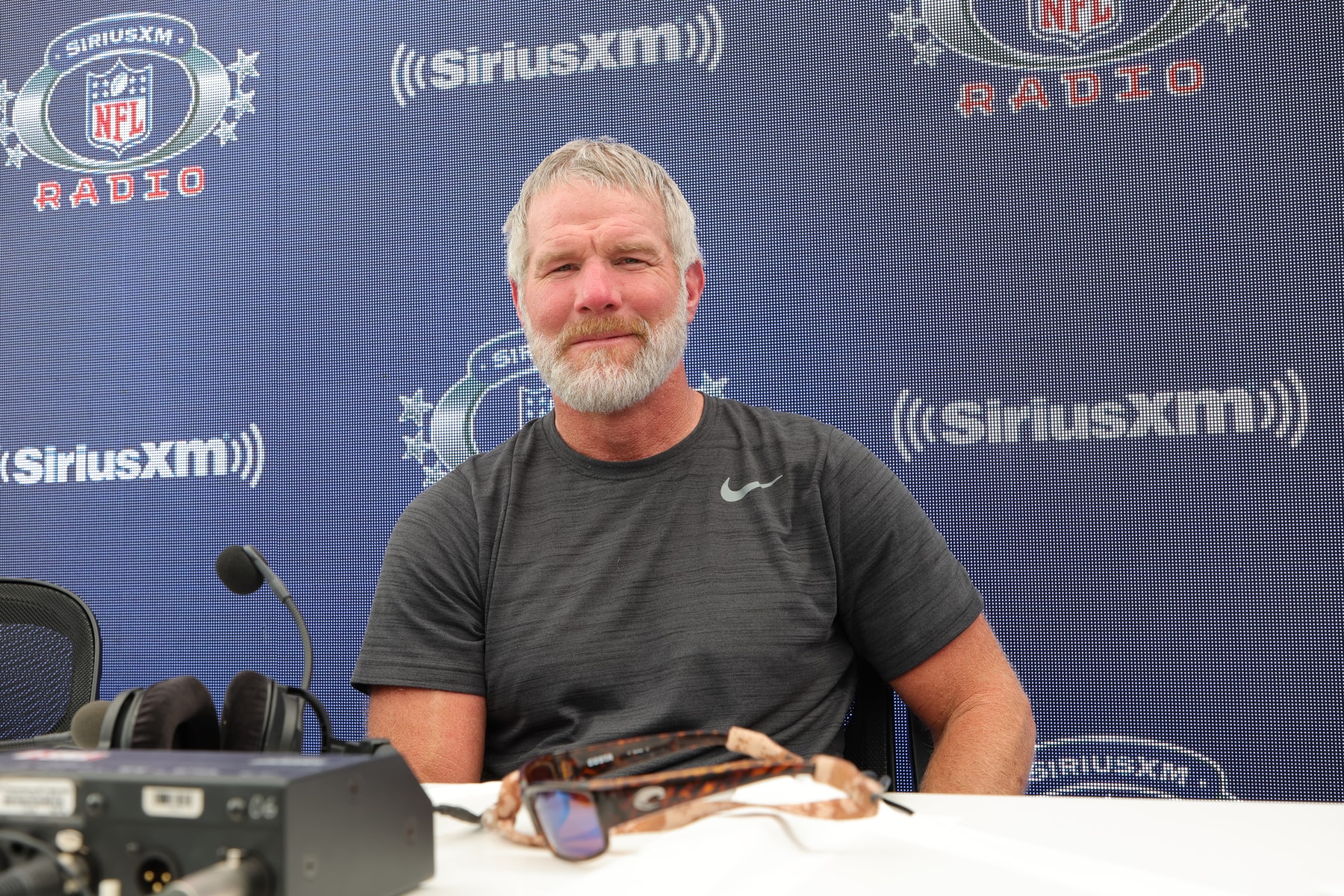 Brett Favre ends lawsuit after sportscaster Pat McAfee apologizes over  'stealing from poor' remark