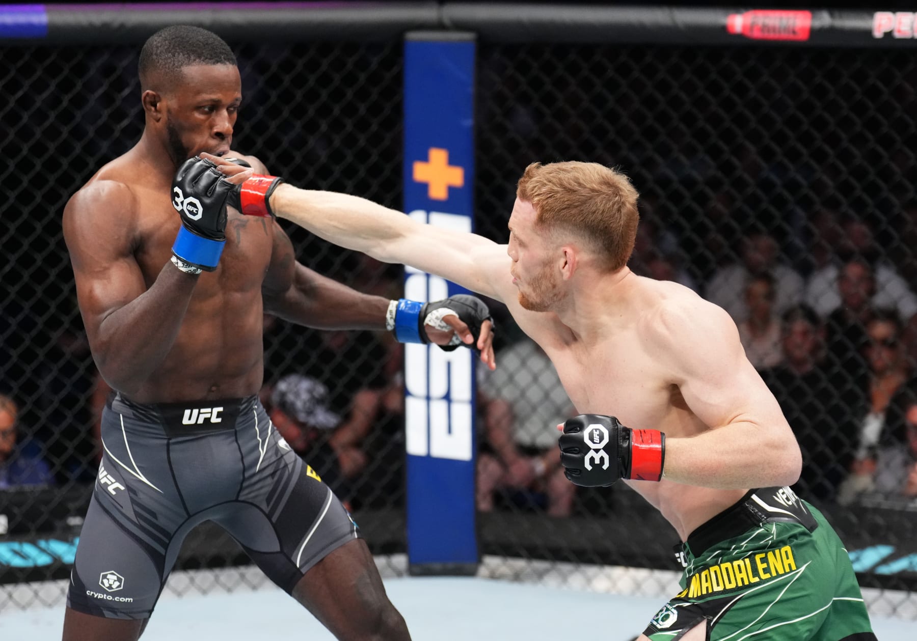 PERTH, AUSTRALIA - FEBRUARY 12: (R-L) Jack Della Maddalena of Australia punches Randy Brown of Jamaica in a welterweight fight during the UFC 284 event at RAC Arena on February 12, 2023 in Perth, Australia. (Photo by Chris Unger/Zuffa LLC via Getty Images)