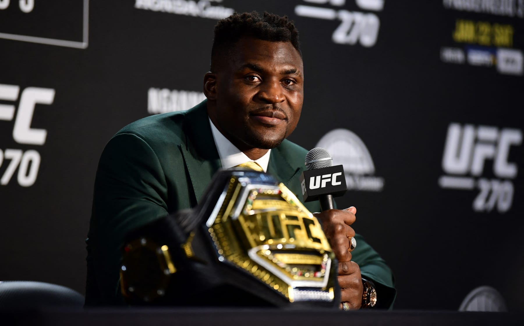 Champion Cameroon's Francis Ngannou takes questions in the press room after defeating French Ciryl Gane in their UFC 270 championship fight in Anaheim on January 22, 2022. (Photo by Frederic J. BROWN / AFP) (Photo by FREDERIC J. BROWN/AFP via Getty Images)