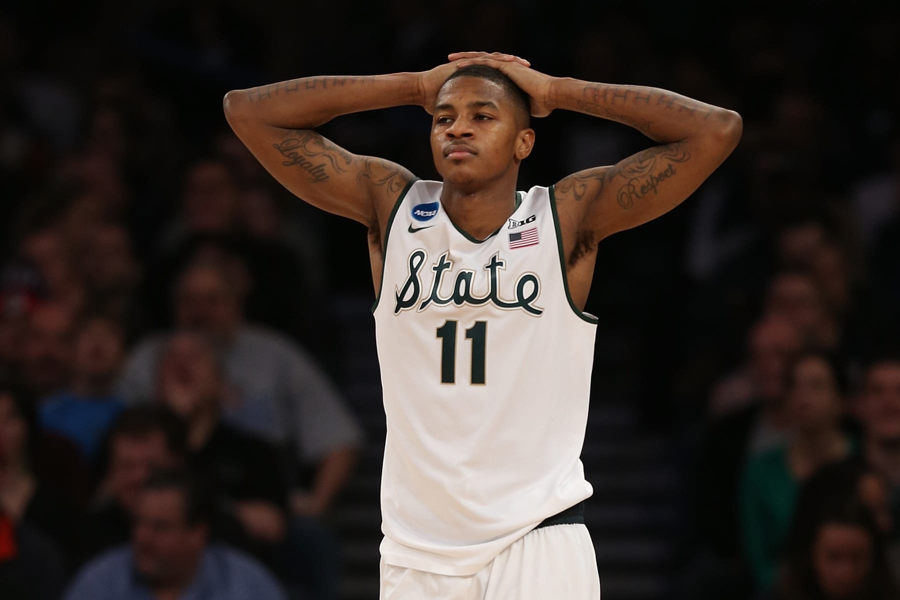 NEW YORK, NY - MARCH 30:  Keith Appling #11 of the Michigan State Spartans reacts against the Connecticut Huskies during the East Regional Final of the 2014 NCAA Men's Basketball Tournament at Madison Square Garden on March 30, 2014 in New York City.  (Photo by Bruce Bennett/Getty Images)