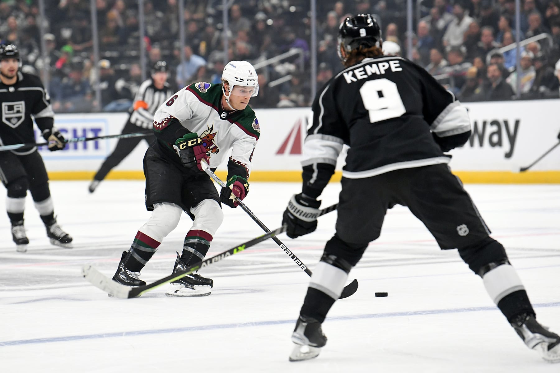 LOS ANGELES, CA - DECEMBER 01: Arizona Coyotes Defenceman Jakob Chychrun (6) carries the puck as Los Angeles Kings Left Wing Adrian Kempe (9) looks on during an NHL game between the Arizona Coyotes and the Los Angeles Kings on December 1st, 2022, at the Crypto.com Arena in Los Angeles, CA. (Photo by Rob Curtis/Icon Sportswire via Getty Images)