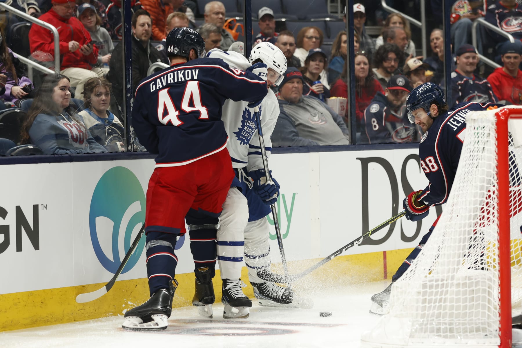 COLUMBUS, OH - MARCH 07: Toronto Maple Leafs center Auston Matthews (34) defended by Columbus Blue Jackets defenceman Vladislav Gavrikov (44) behind the goal during the game between the Columbus Blue Jackets and the Toronto Maple Leafs on March 7, 2022, at Nationwide Arena in Columbus, Ohio. (Photo by Graham Stokes/Icon Sportswire via Getty Images)
