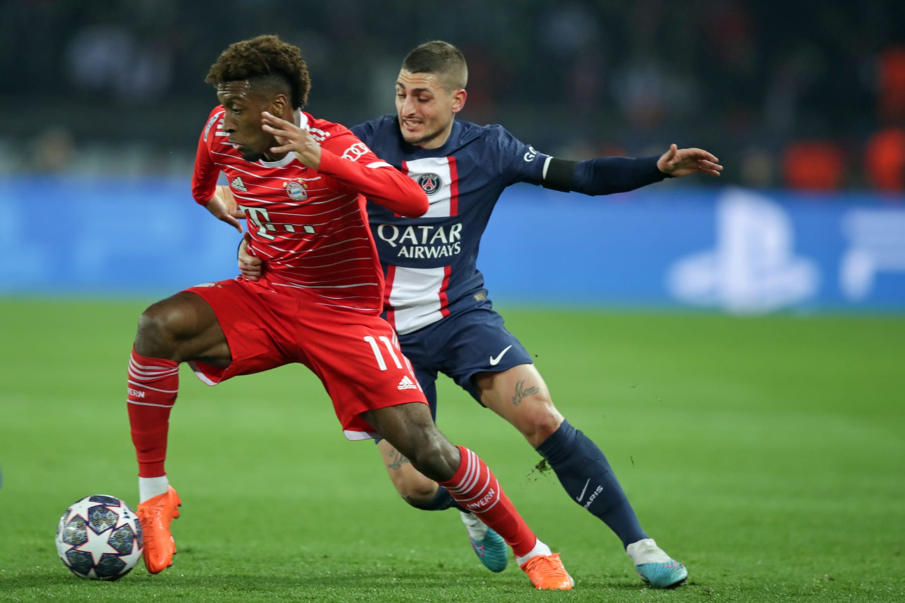 PARIS, FRANCE - FEBRUARY 14: Kingsley Coman of Bayern Muenchen vies with Marco Verratti of FC Paris Saint Germain during the UEFA Champions League round of 16 leg one match between Paris Saint-Germain and FC Bayern München at Parc des Princes on February 14, 2023 in Paris, France. (Photo by Christina Pahnke - sampics/Corbis via Getty Images)