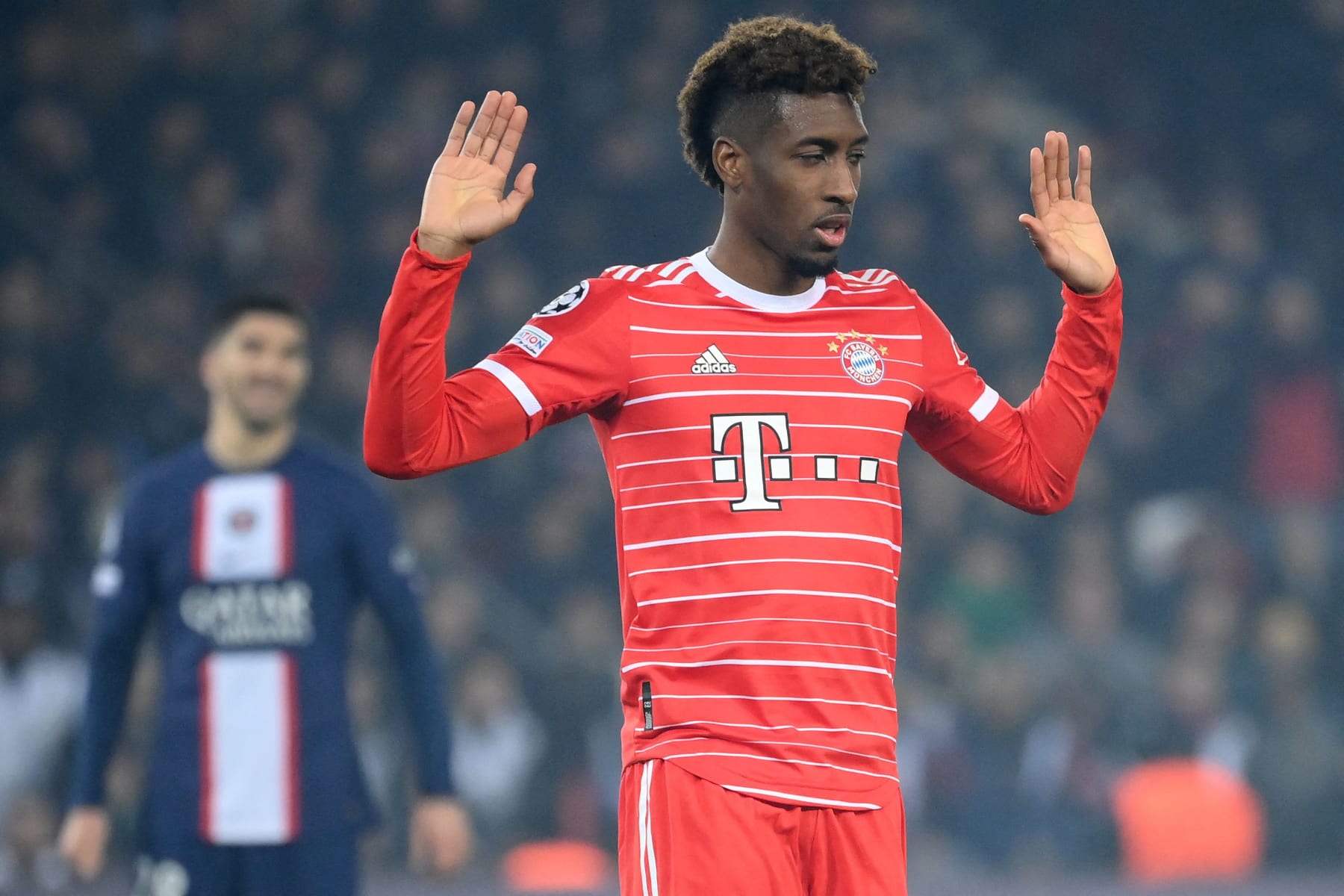 Bayern Munich's French forward Kingsley Coman (R) celebrates scoring his team's first goal during first leg of the UEFA Champions League round of 16 football match between Paris Saint-Germain (PSG) and FC Bayern Munich at the Parc des Princes stadium in Paris on February 14, 2023. (Photo by FRANCK FIFE / AFP) (Photo by FRANCK FIFE/AFP via Getty Images)