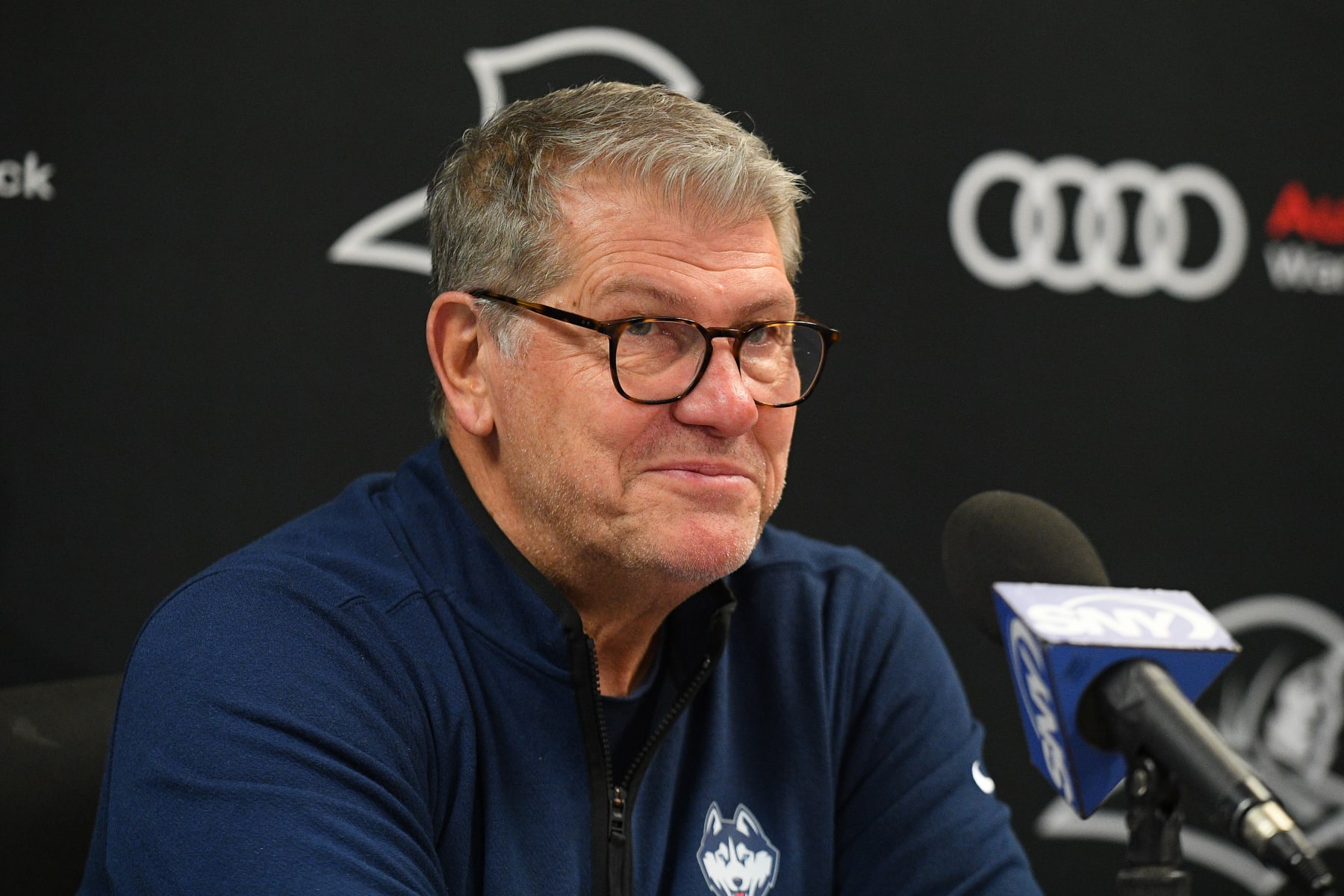 PROVIDENCE, RI - FEBRUARY 01: UConn Huskies head coach Geno Auriemma looks on during a press conference following a women's college basketball game between the UConn Huskies and the Providence Friars on February 1, 2023, at Alumni Hall in Providence, RI. The Huskies defeated the Friars 64-54. (Photo by Erica Denhoff/Icon Sportswire via Getty Images)