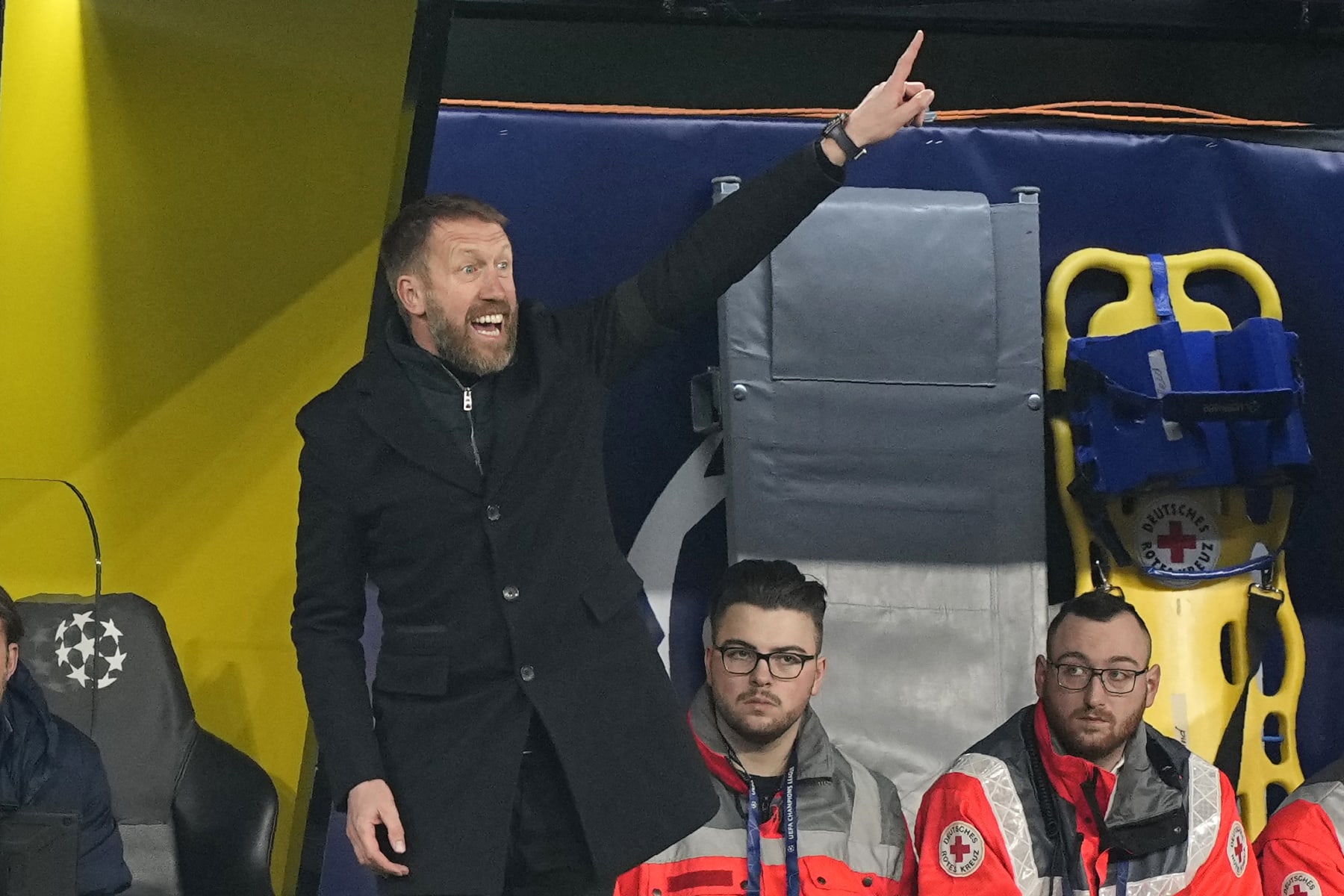 Chelsea's head coach Graham Potter gestures during the Champions League, round of 16, first leg soccer match between Borussia Dortmund and Chelsea FC in Dortmund, Germany, Wednesday, Feb. 15, 2023. (AP Photo/Martin Meissner)
