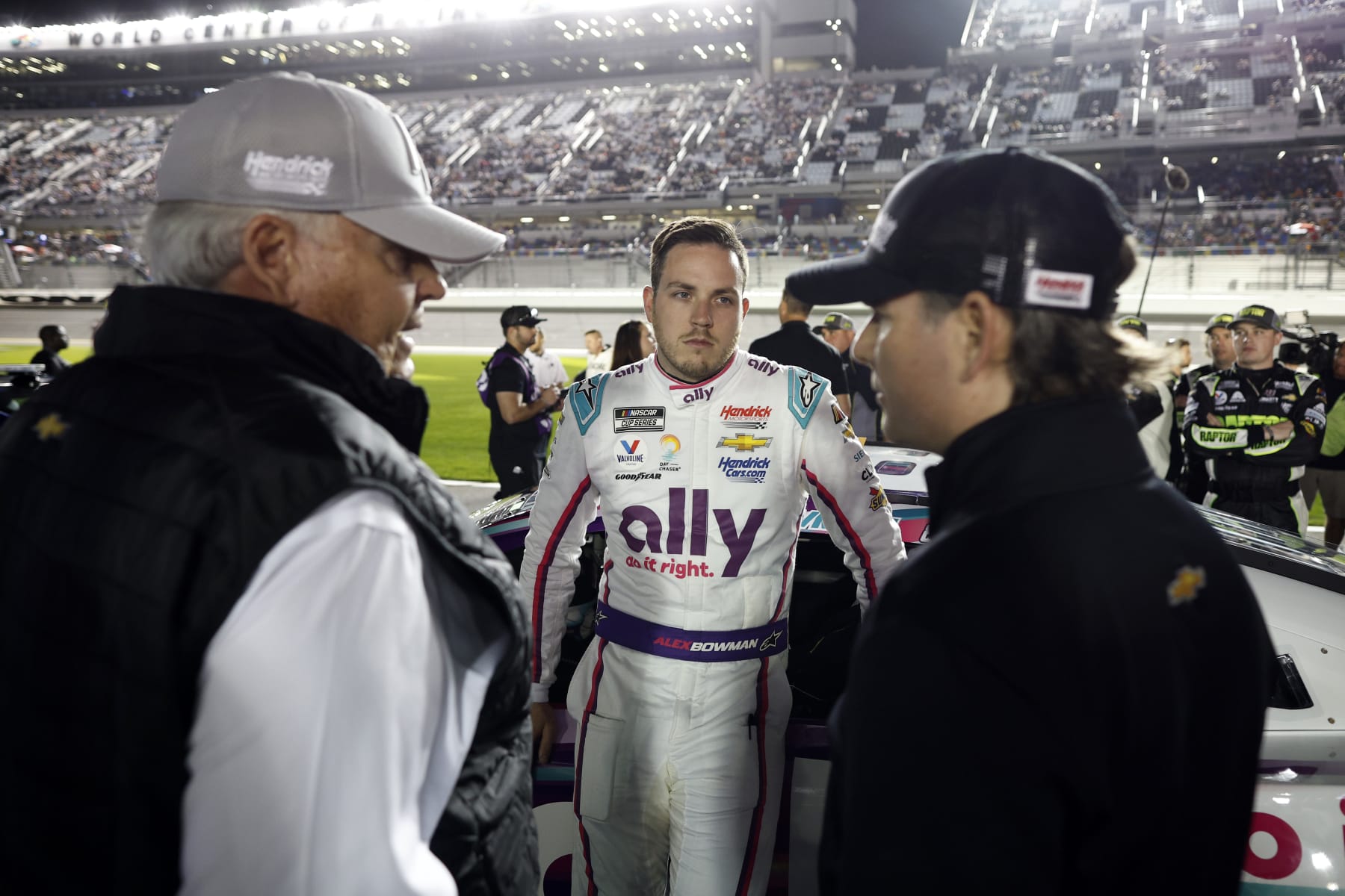 DAYTONA BEACH, FLORIDA - FEBRUARY 16: Alex Bowman, driver of the #48 Ally Chevrolet, speaks to NASCAR Hall of Famer and team owner Rick Hendrick (L) and Jeff Gordon, Vice Chairman of Hendrick Motorsports on the grid prior to the NASCAR Cup Series Bluegreen Vacations Duel #1 at Daytona International Speedway on February 16, 2023 in Daytona Beach, Florida. (Photo by Chris Graythen/Getty Images)