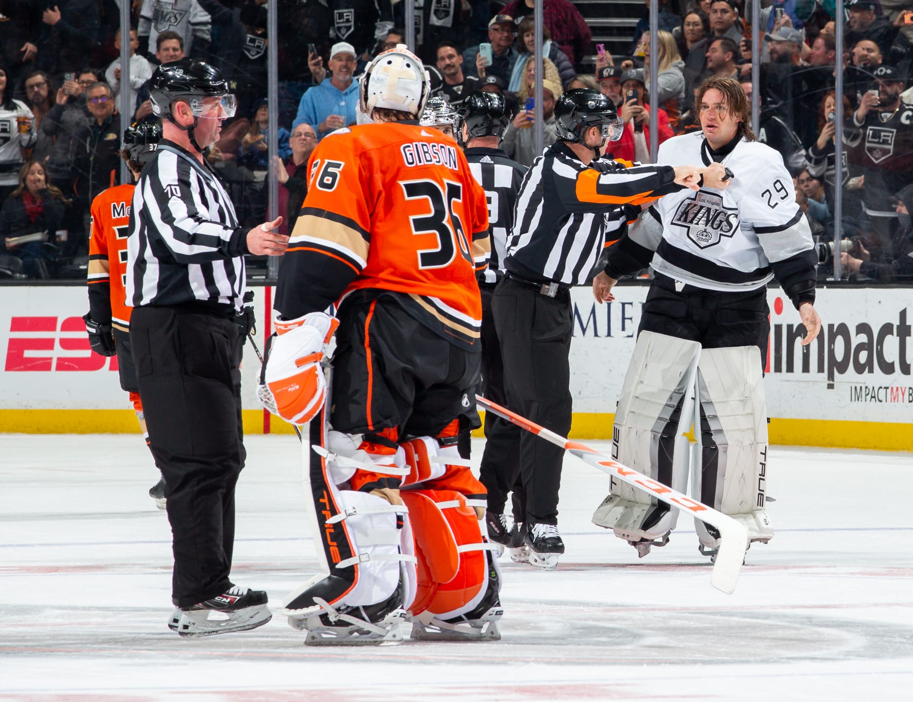 ANAHEIM, CA - FEBRUARY 17: Goaltender Pheonix Copley #29 of the Los Angeles Kings and goaltender John Gibson #36 of the Anaheim Ducks exchange words as Copley leaves the ice after a scrum during the second period of the game at Honda Center on February 17, 2023 in Anaheim, California. Copley was assessed a match penalty for the play. (Photo by Debora Robinson/NHLI via Getty Images)