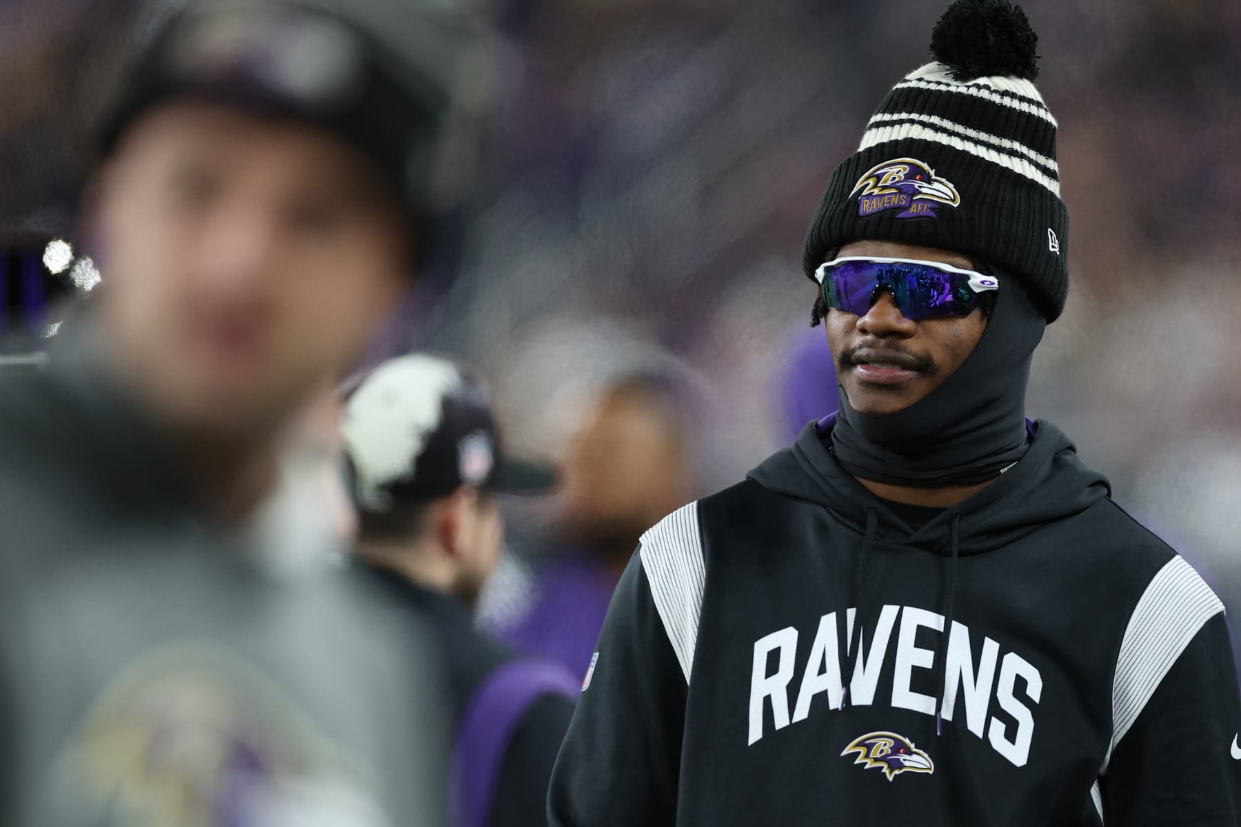BALTIMORE, MARYLAND - JANUARY 01: Quarterback Lamar Jackson #8 of the Baltimore Ravens looks on from the sideline as the Baltimore Ravens play against the Pittsburgh Steelers at M&T Bank Stadium on January 1, 2023 in Baltimore, Maryland. (Photo by Patrick Smith/Getty Images) BALTIMORE, MARYLAND - JANUARY 01: Quarterback Lamar Jackson #8 of the Baltimore Ravens looks on from the sideline as the Baltimore Ravens play against the Pittsburgh Steelers at M&T Bank Stadium on January 1, 2023 in Baltimore, Maryland. (Photo by Patrick Smith/Getty Images)