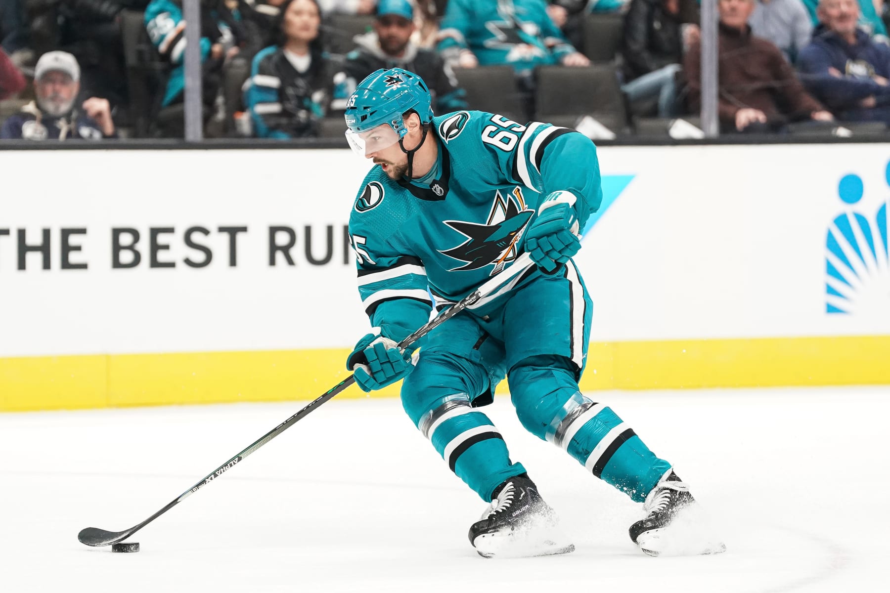 SAN JOSE, CA - FEBRUARY 18: Erik Karlsson #65 of the San Jose Sharks skates with the puck against the Buffalo Sabres at SAP Center on February 18, 2023 in San Jose, California. (Photo by Kavin Mistry/NHLI via Getty Images) SAN JOSE, CA - FEBRUARY 18: Erik Karlsson #65 of the San Jose Sharks skates with the puck against the Buffalo Sabres at SAP Center on February 18, 2023 in San Jose, California. (Photo by Kavin Mistry/NHLI via Getty Images)