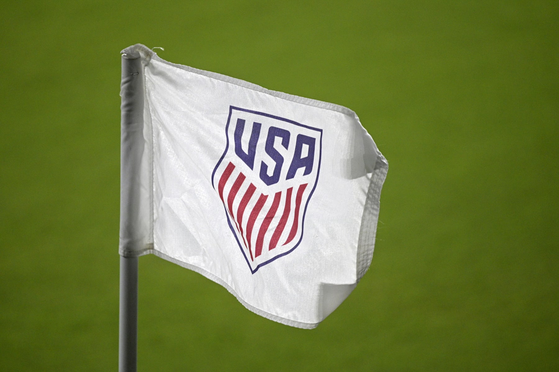 The United States Soccer Federation logo is viewed on a corner flag on the pitch during the first half of an international friendly soccer match between the United States and Trinidad and Tobago, Sunday, Jan. 31, 2021, in Orlando, Fla. (AP Photo/Phelan M. Ebenhack)