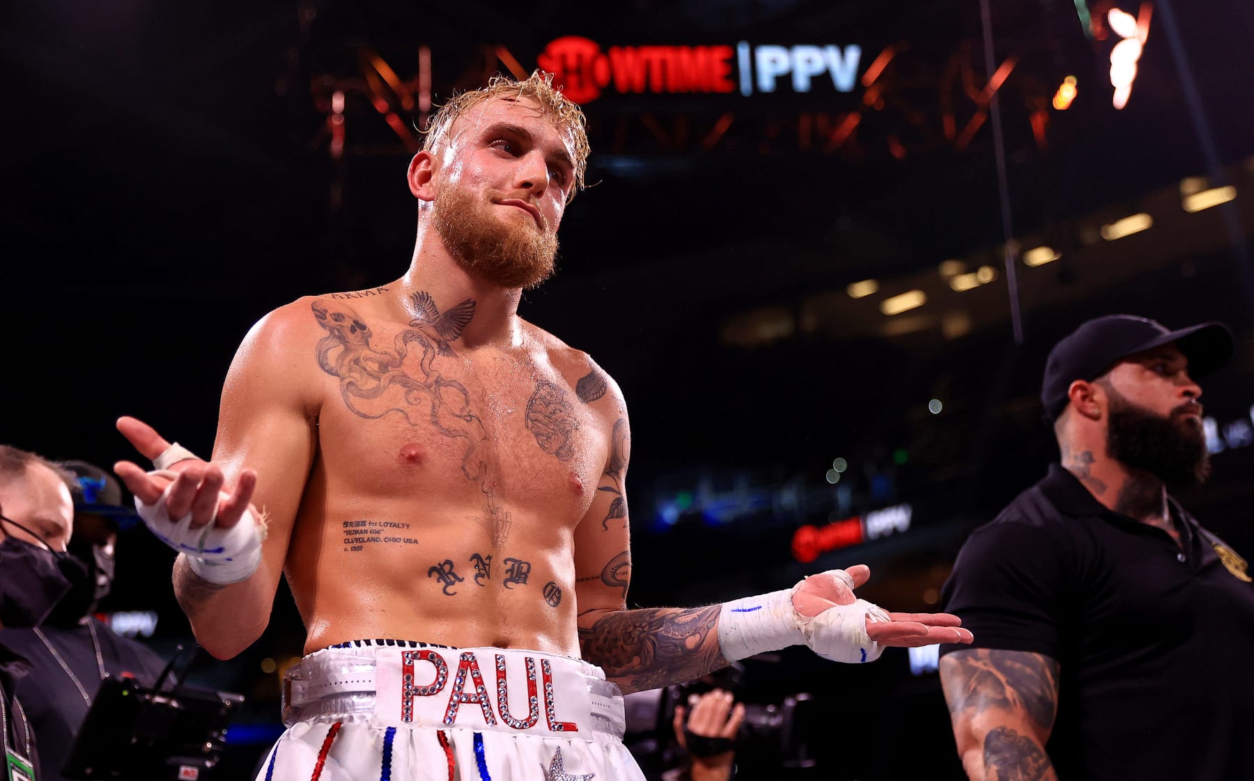 TAMPA, FLORIDA - DECEMBER 18: Jake Paul reacts to knocking out Tyron Woddley in the sixth round during an eight-round cruiserweight bout at the Amalie Arena on December 18, 2021 in Tampa, Florida. (Photo by Mike Ehrmann/Getty Images)