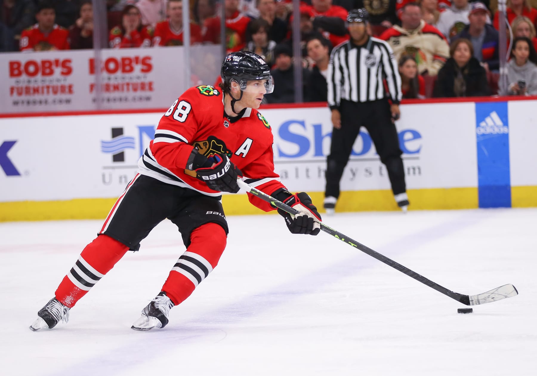 CHICAGO, IL - FEBRUARY 21: Chicago Blackhawks Right Wing Patrick Kane (88) controls the puck during a game between the Vegas Golden Knights and the Chicago Blackhawks on February 21, 2023 at the United Center in Chicago, IL. (Photo by Melissa Tamez/Icon Sportswire via Getty Images)