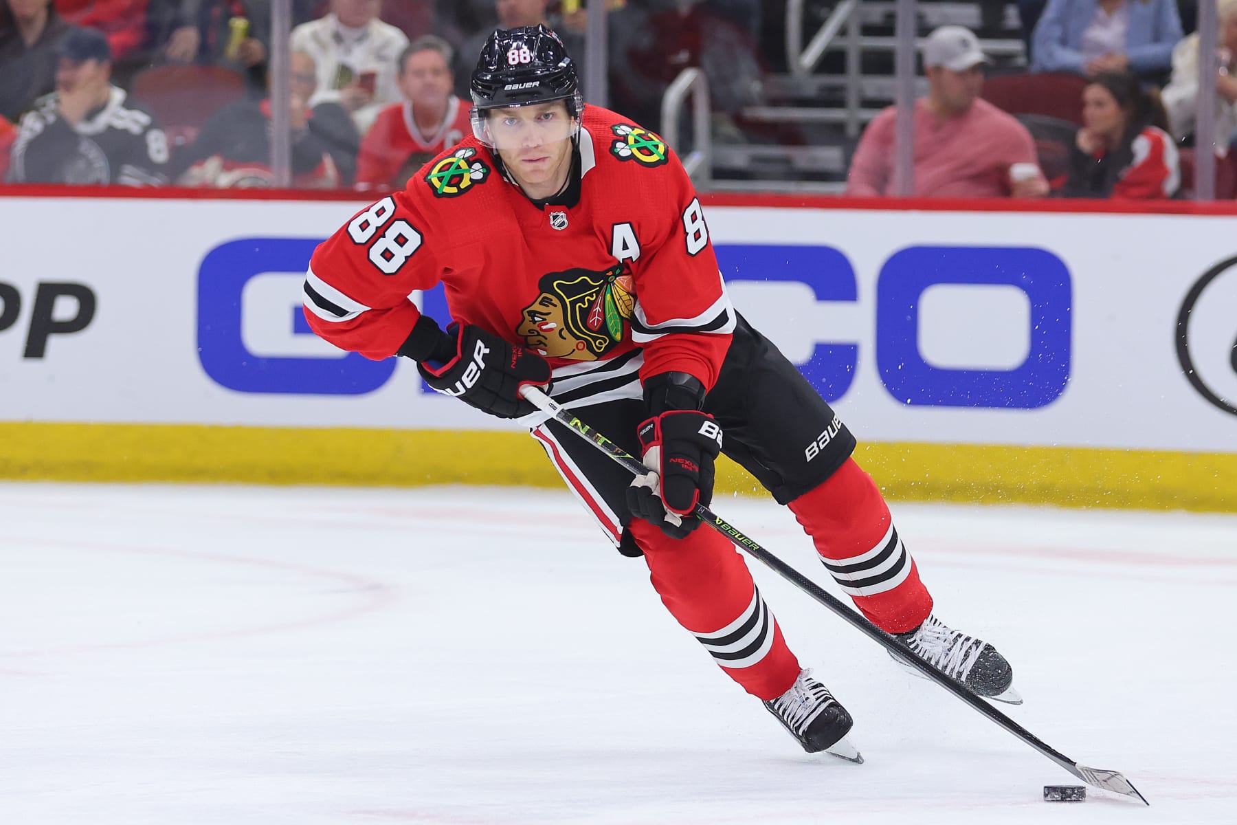 CHICAGO, ILLINOIS - FEBRUARY 21: Patrick Kane #88 of the Chicago Blackhawks controls the puck against the Vegas Golden Knights during the first period at United Center on February 21, 2023 in Chicago, Illinois. (Photo by Michael Reaves/Getty Images)