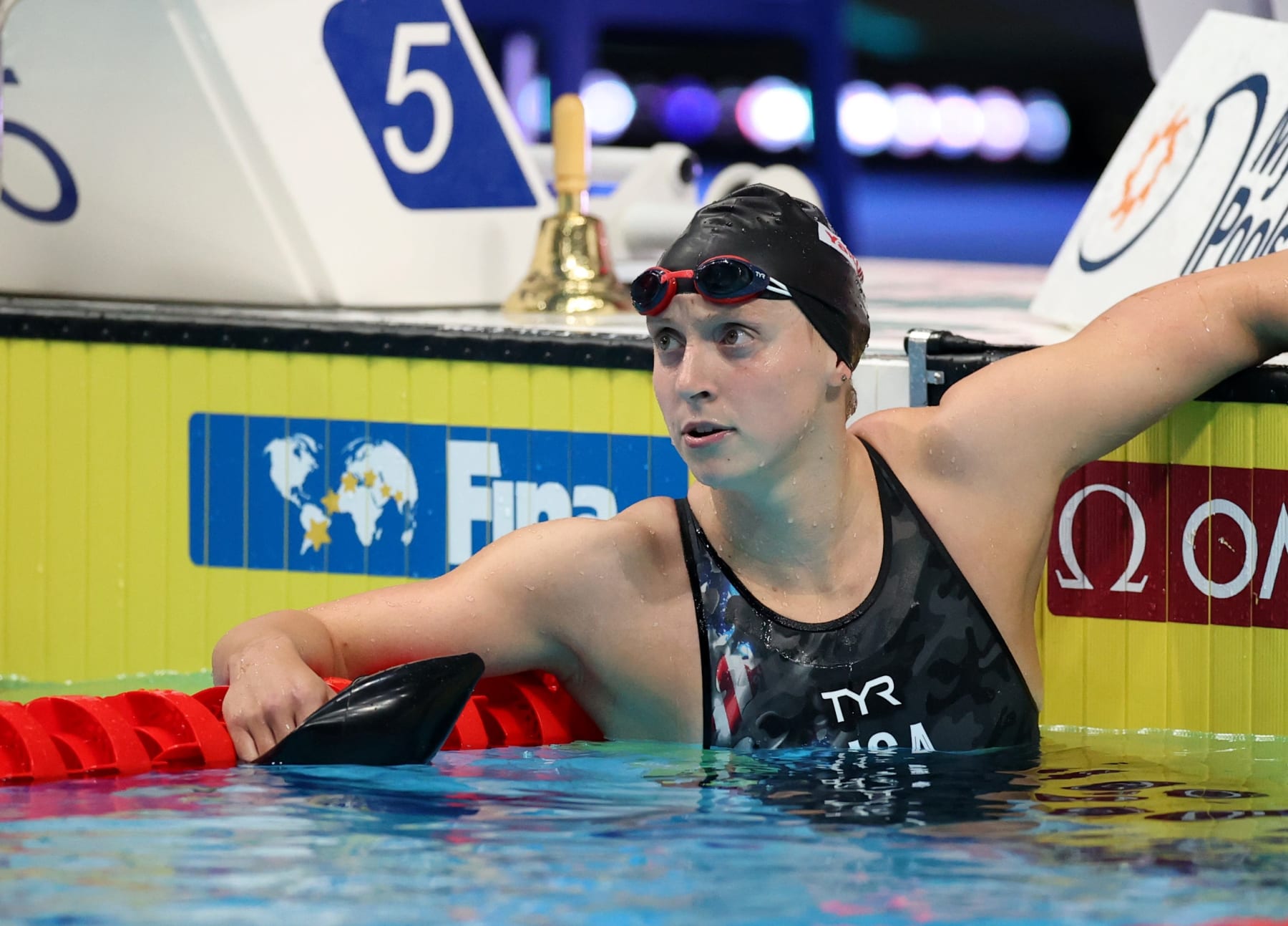 File photo taken on June 24, 2022 shows Katie Ledecky of the United States reacts after the women's 800m freestyle final at the 19th FINA World Championships in Budapest, Hungary. Ledecky won the women's 800m freestyle at the FINA World Championships in Budapest, to take the fifth consecutive title in the event. In this tournament, the 25-year-old clinched four gold medals to take her world championships gold medal tally to 19. Ledecky also broke the women's short-course world record in the 1,500m and 800m freestyle at the FINA World Cup. (Photo by Li Ying/Xinhua via Getty Images)