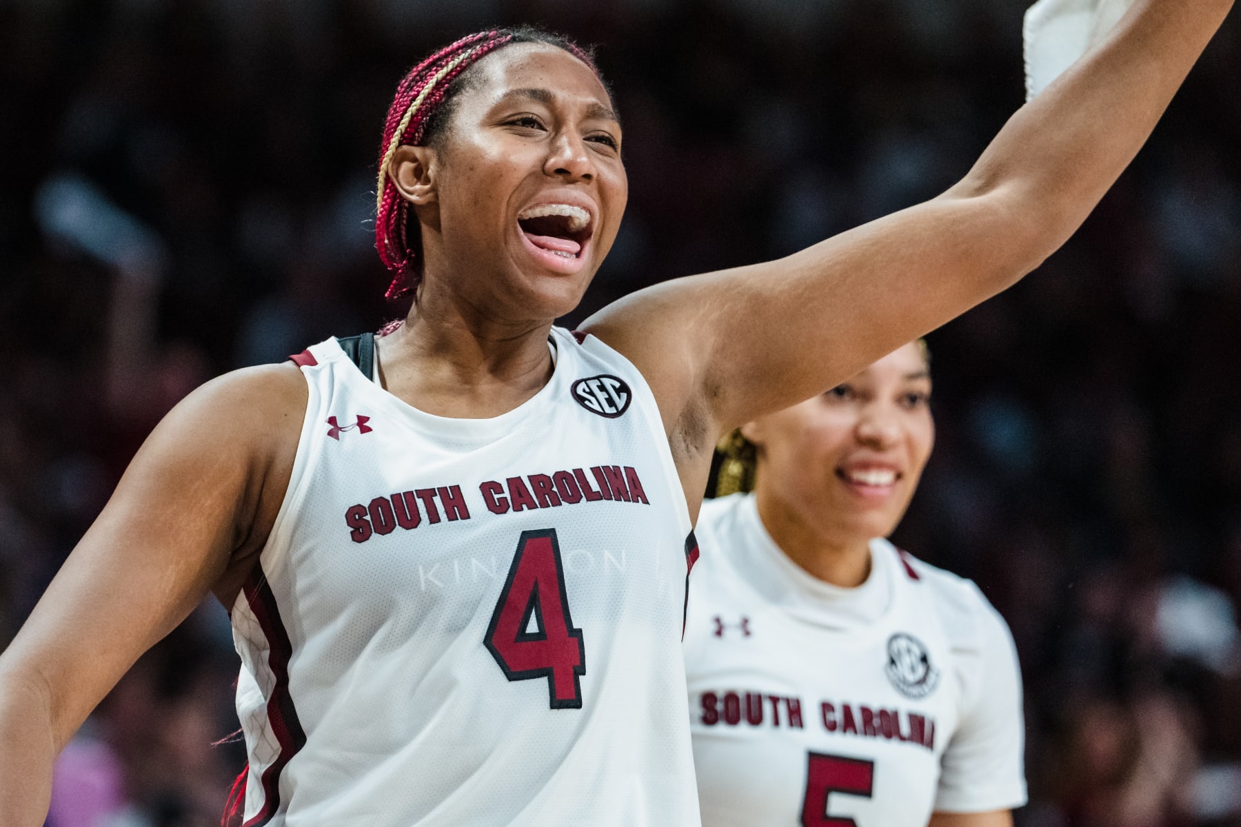 COLUMBIA, SOUTH CAROLINA - FEBRUARY 26: Aliyah Boston #4 of the South Carolina Gamecocks cheers from the bench in the third quarter of their game against the Georgia Lady Bulldogs at Colonial Life Arena on February 26, 2023 in Columbia, South Carolina. (Photo by Jacob Kupferman/Getty Images)